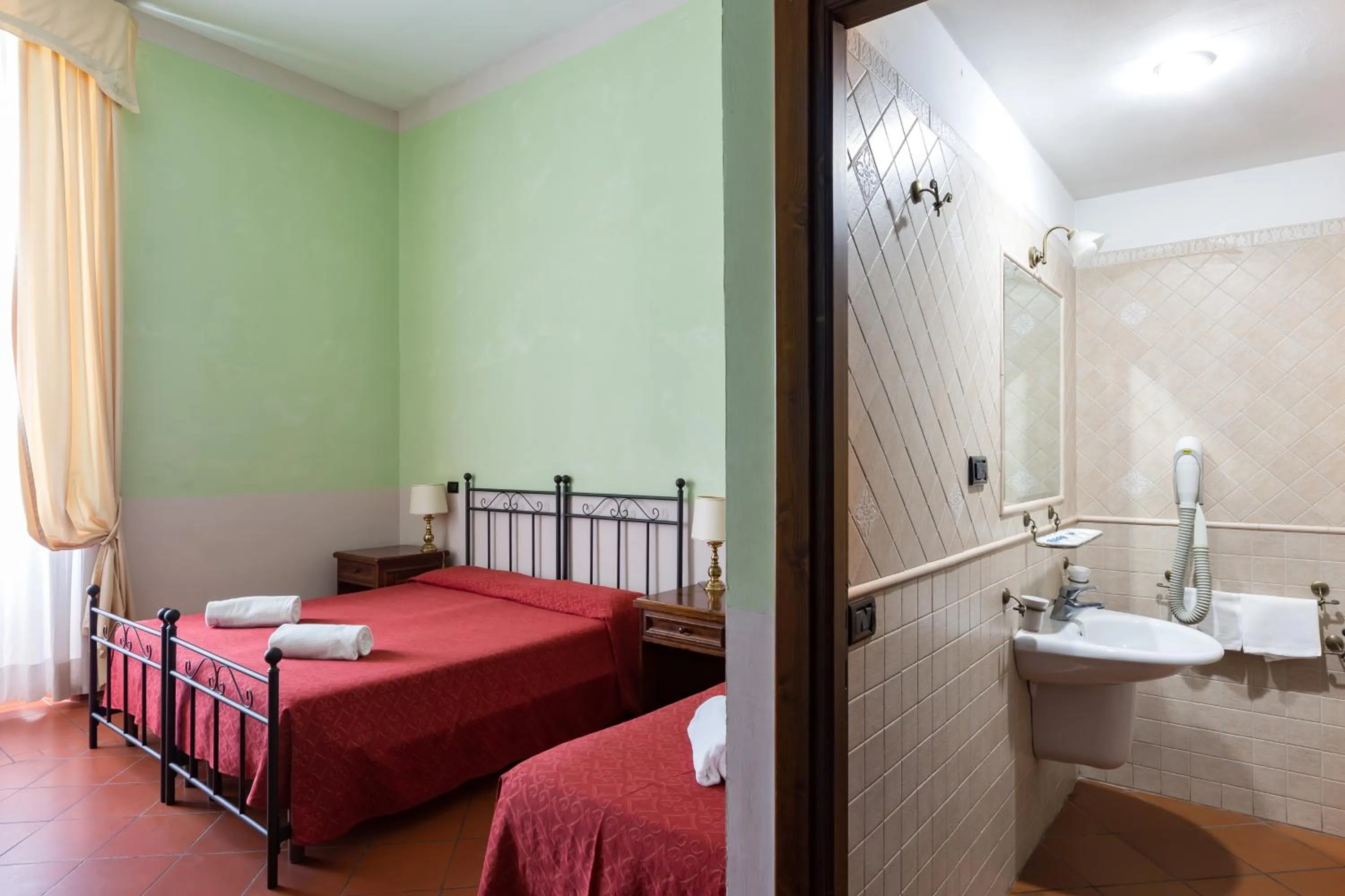 Photo of the whole room, Bed in Domus Sessoriana