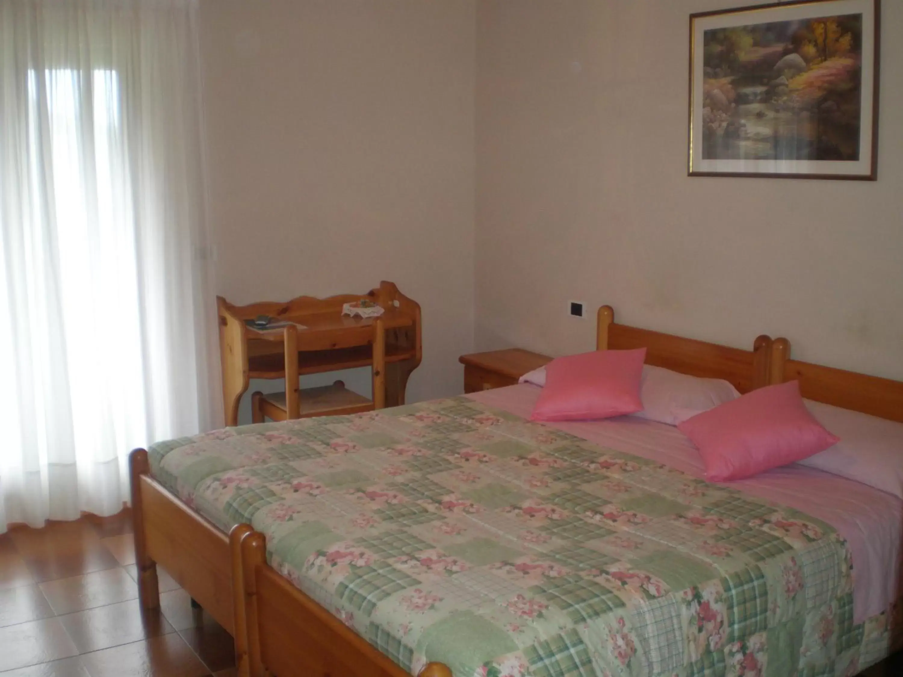 Quadruple Room in Hotel Residence La Rosa Quadruple Room in Hotel Residence La Rosa