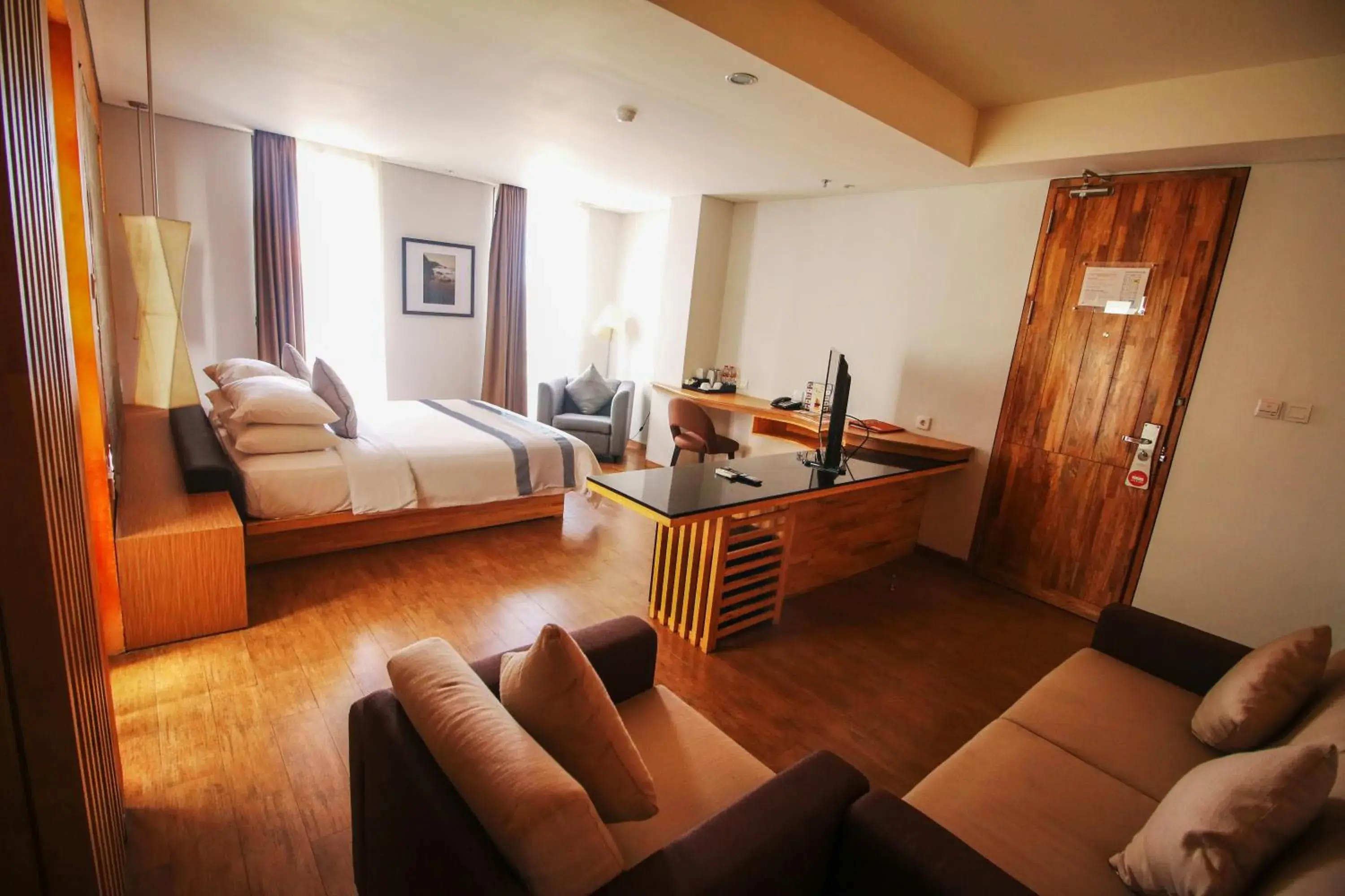 Photo of the whole room, Bed in Liberta Hotel Jimbaran Photo of the whole room, Bed in Liberta Hotel Jimbaran