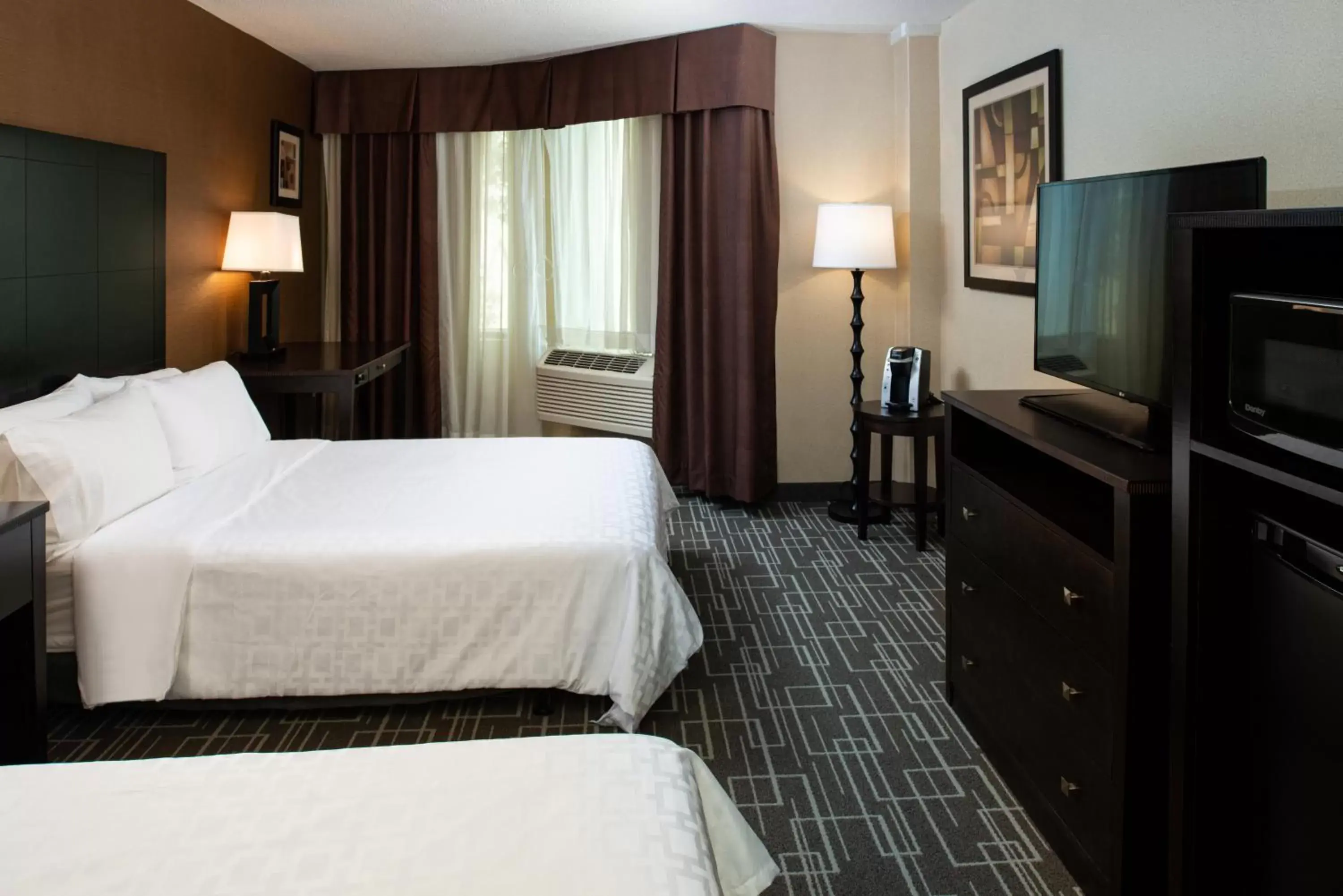 Photo of the whole room, Bed in Holiday Inn Charlotte Center City, an IHG Hotel