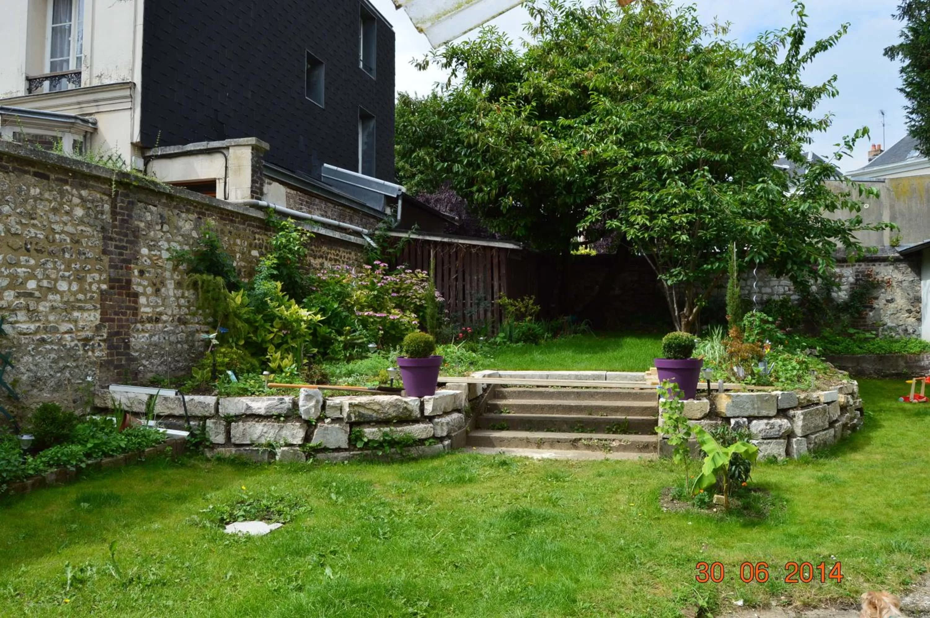 Garden in Hôtel Céline - Hôtel de la Gare