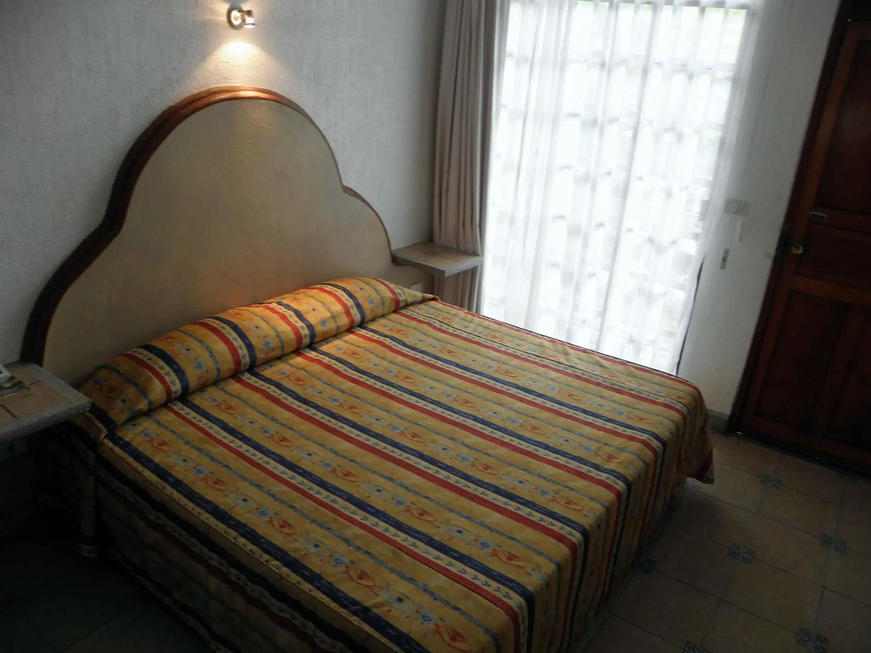 Decorative detail, Bed in Hotel Fenix