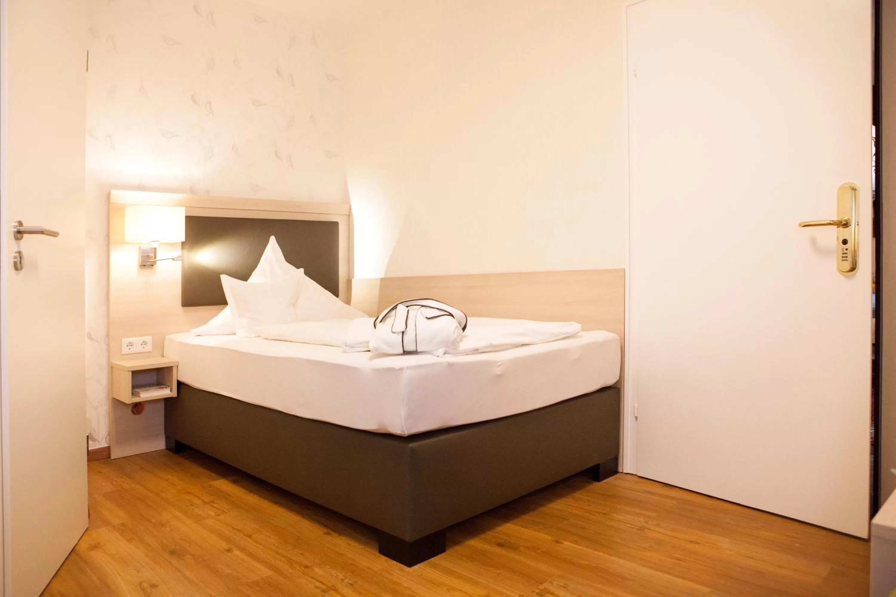 Bed in Ferienhotel Haus Becker