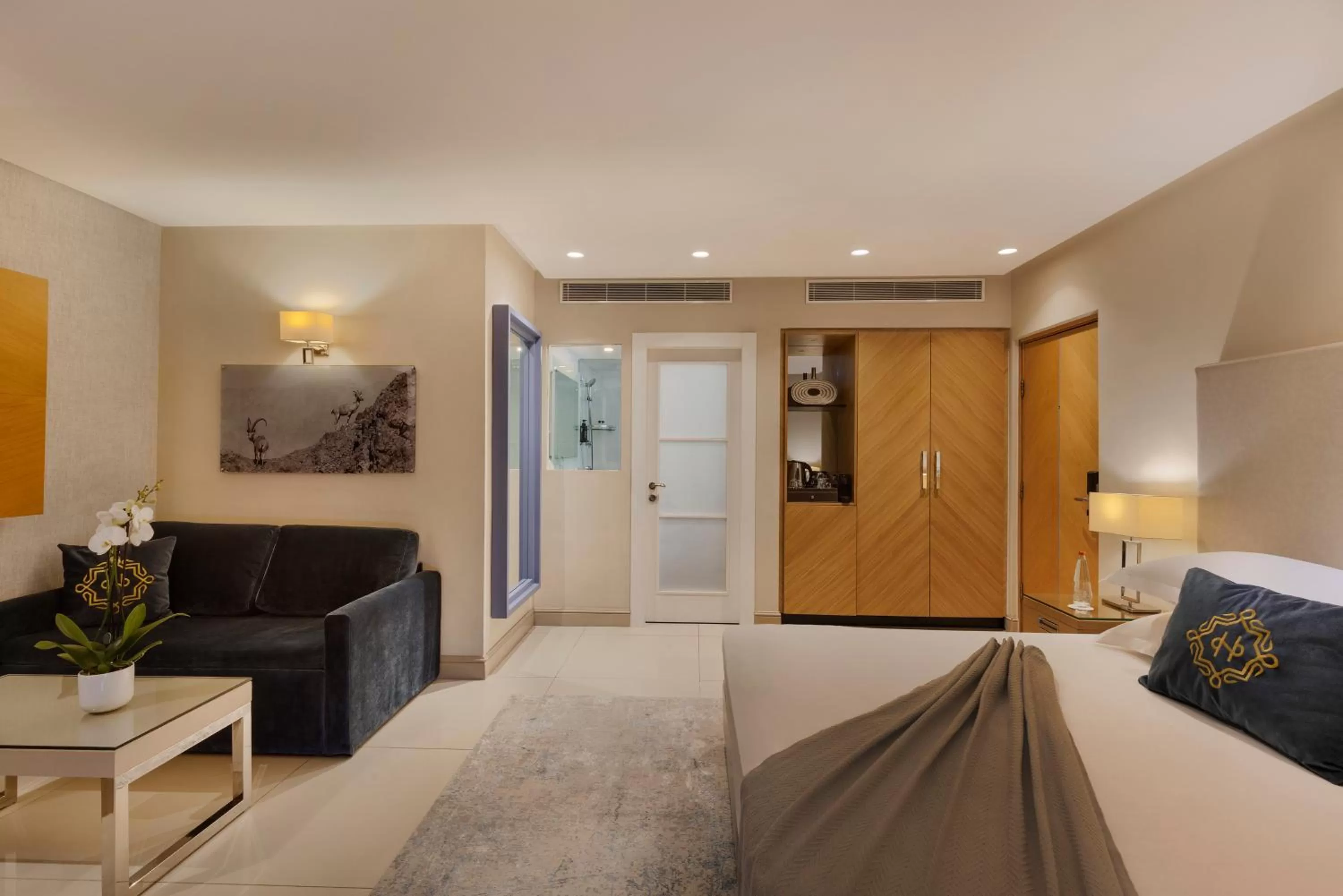 Living room, Bed in Herbert Samuel The Reef Eilat