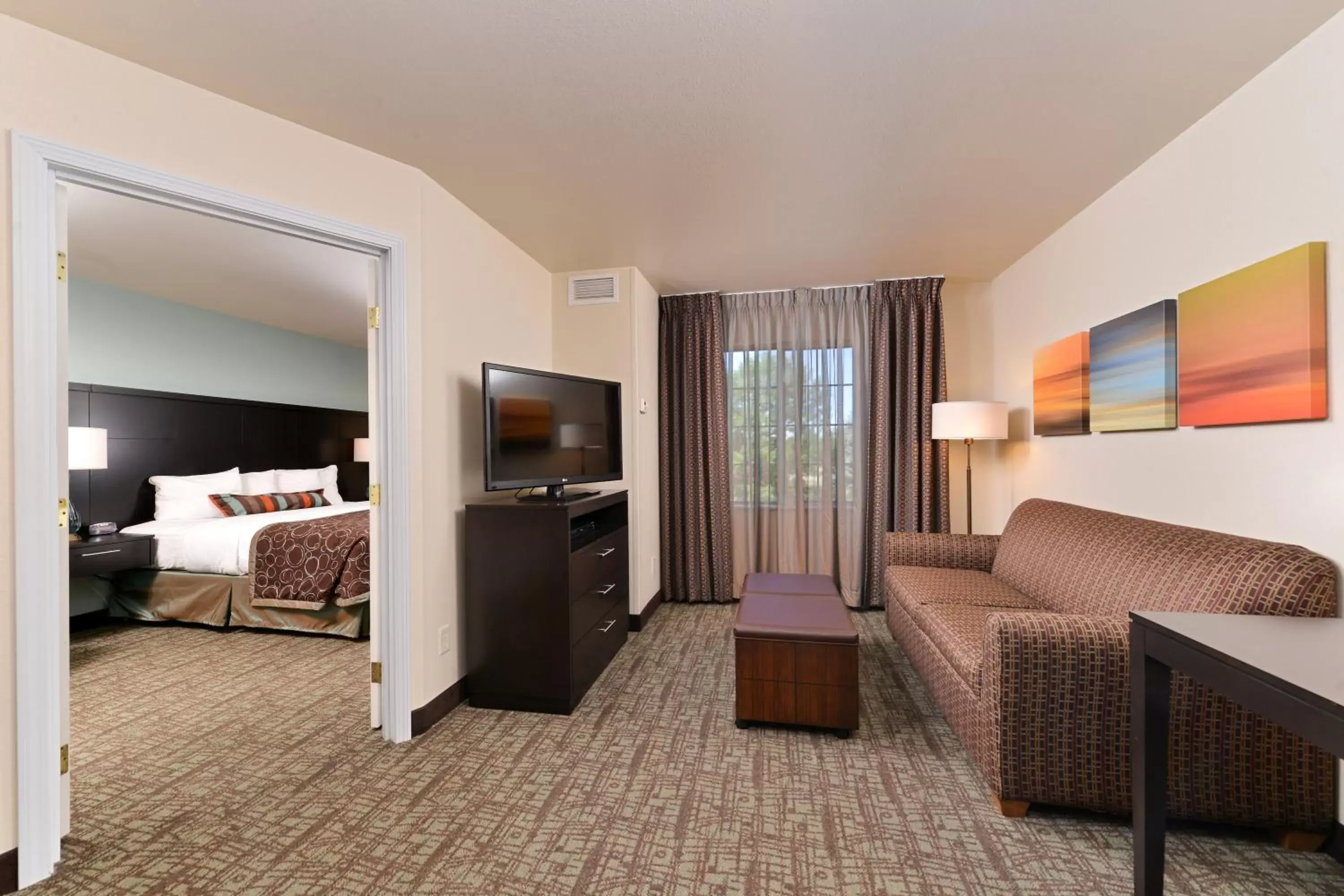 Photo of the whole room, Seating Area in Staybridge Suites Sioux Falls at Empire Mall, an IHG Hotel