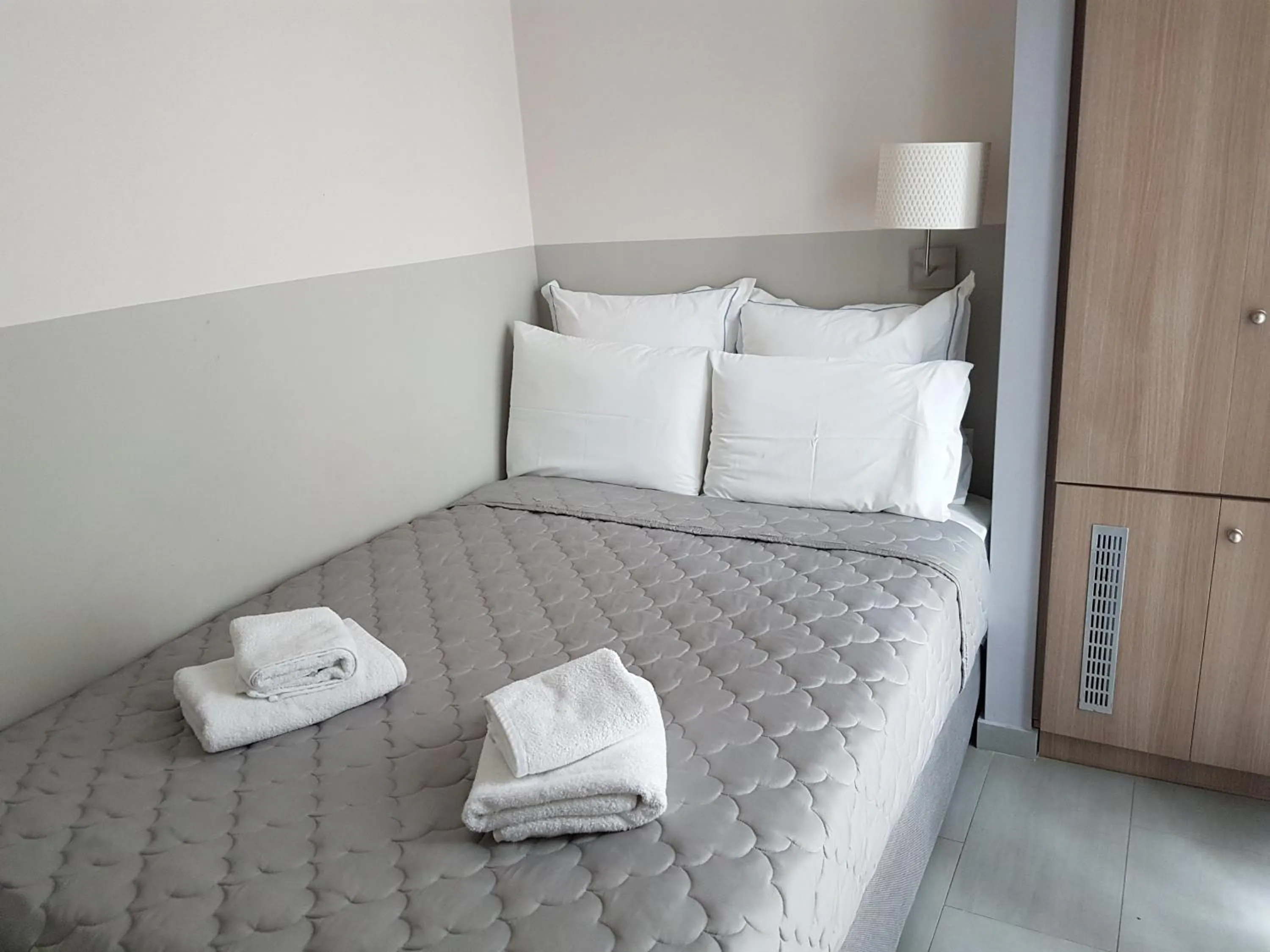 Bed in Dimitra Boutique Hotel