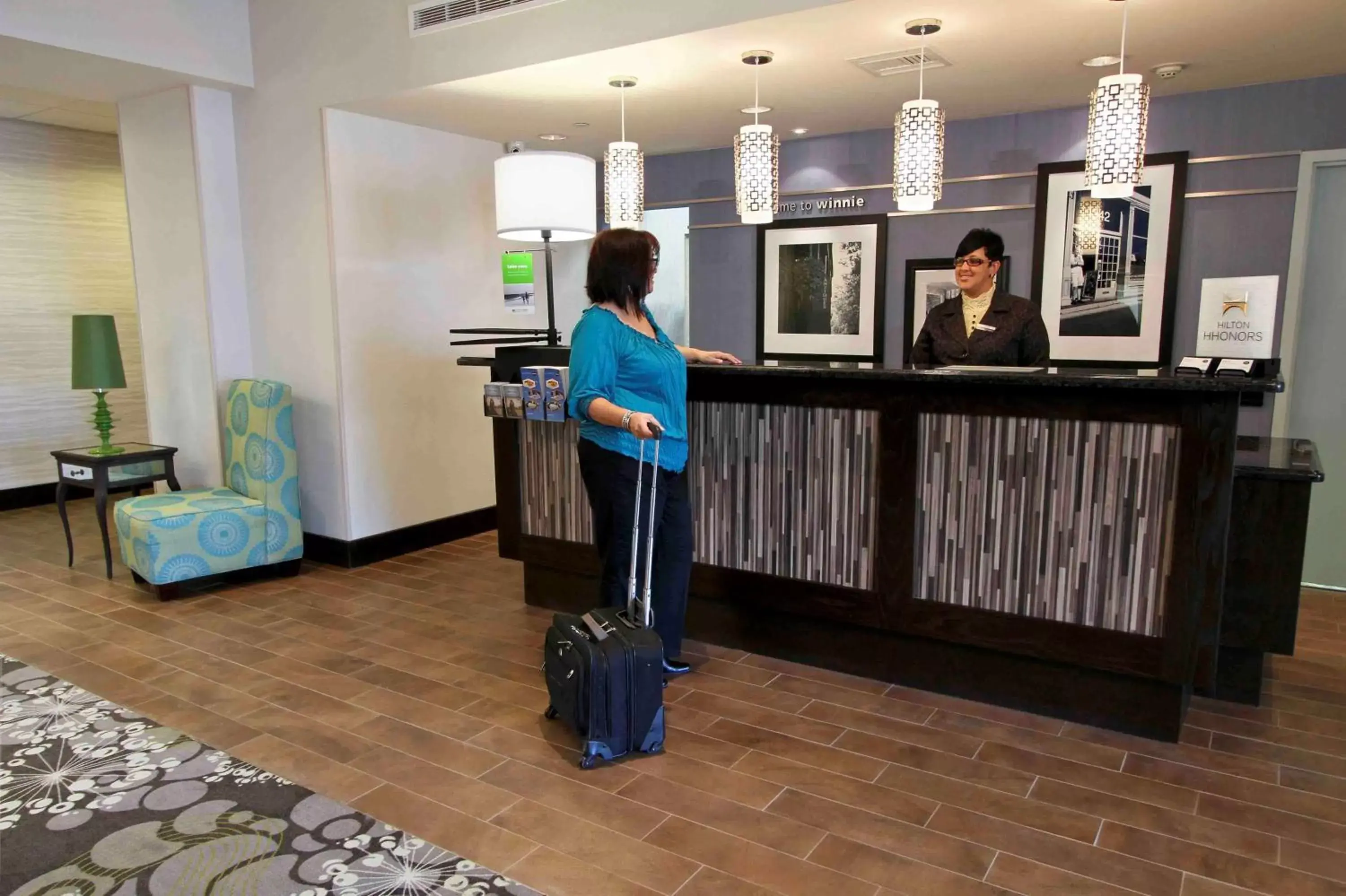 Lobby or reception, Staff in Hampton Inn & Suites Winnie