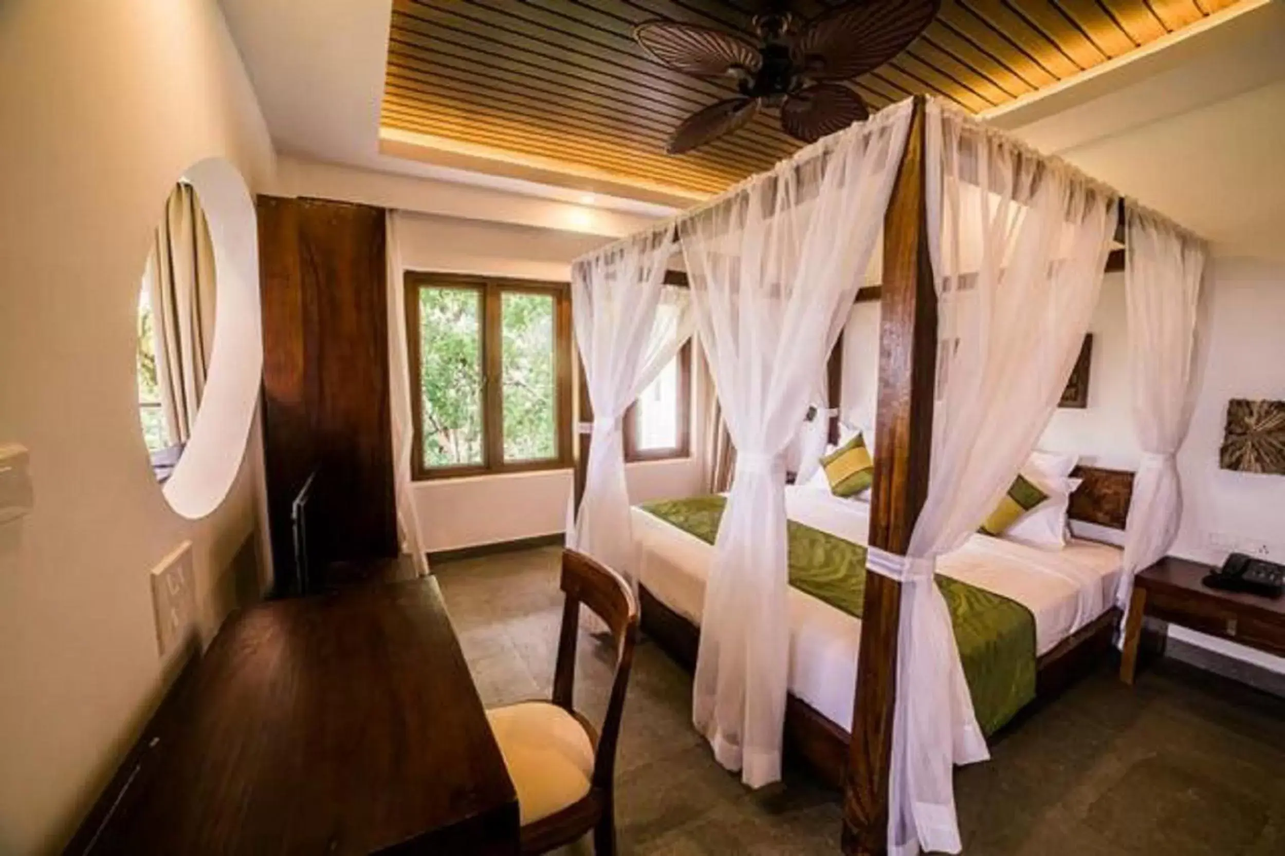 Bed in Elixir Hills Suites Resort and Spa