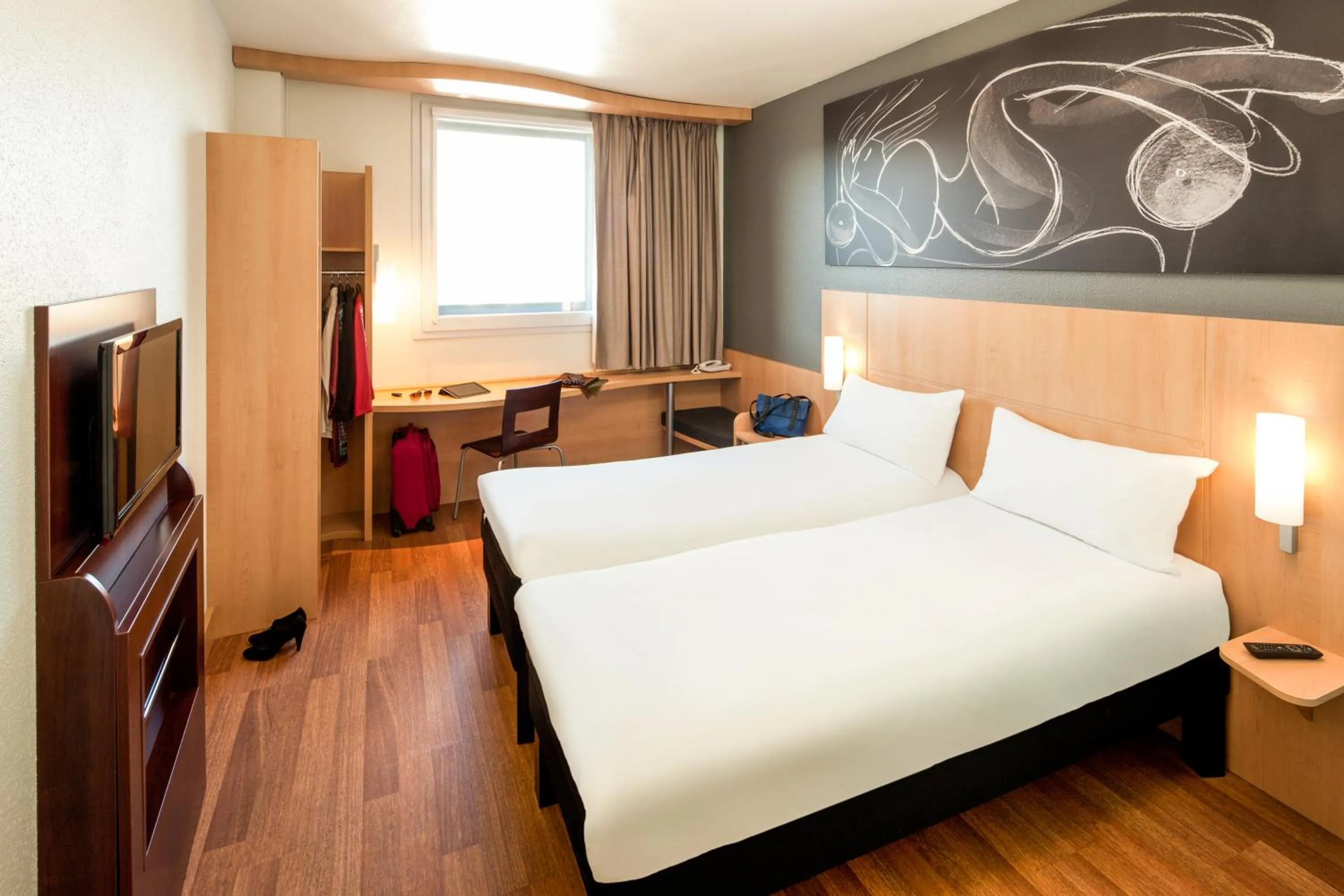 Bed in Ibis Barcelona Meridiana