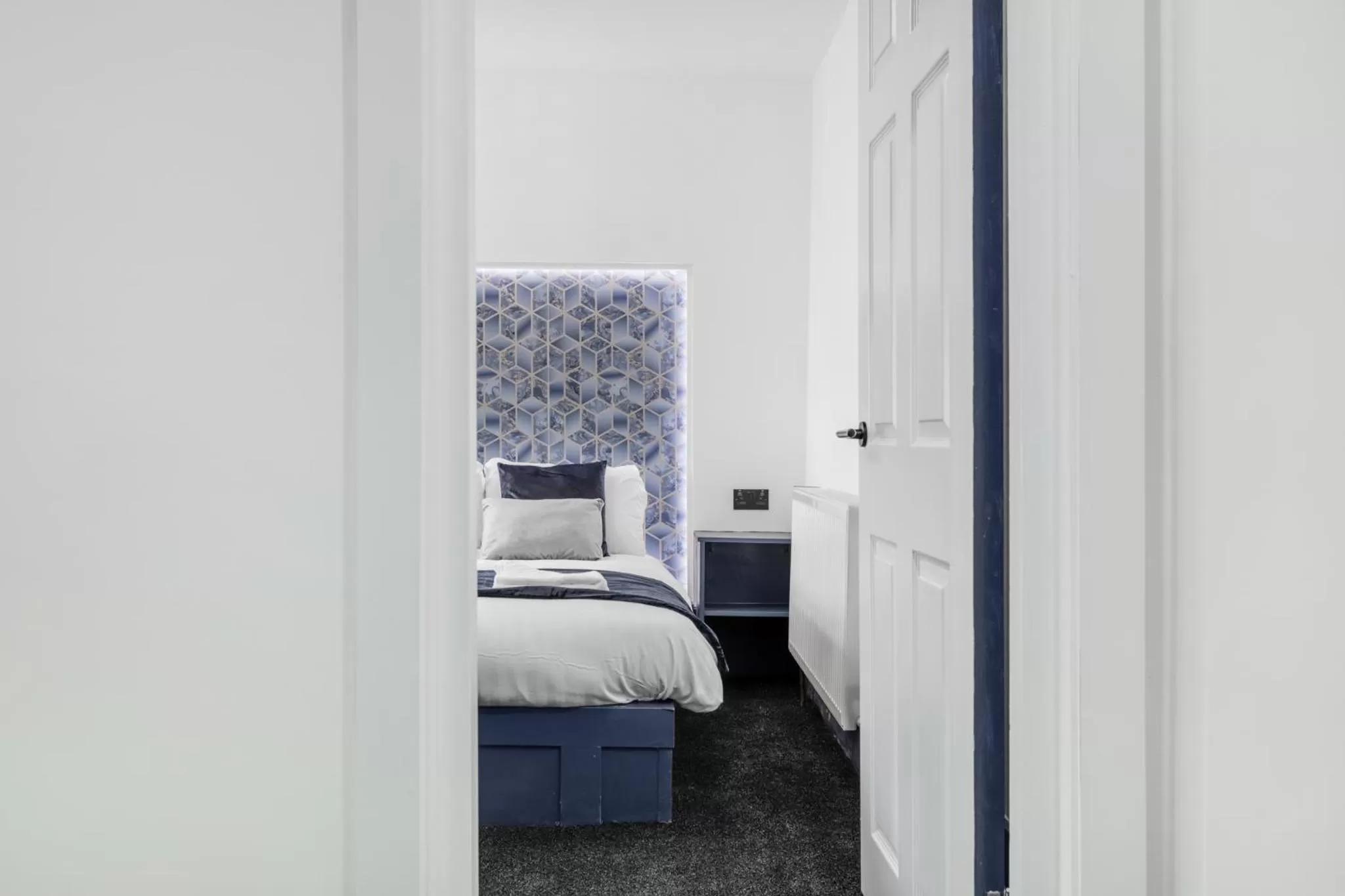 Bedroom, Bed in Crystal Towers Sasco Apartments