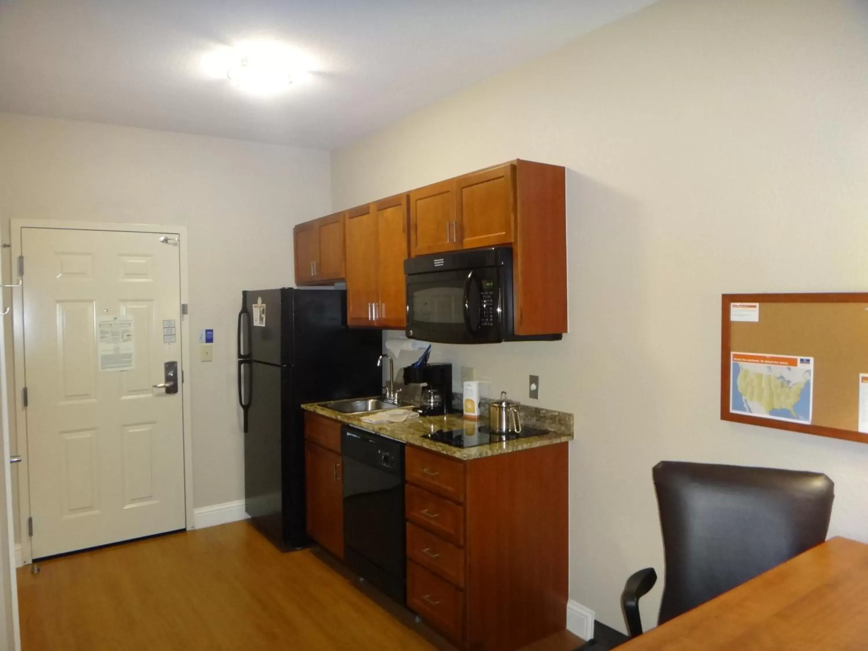 Photo of the whole room, Kitchen/Kitchenette in Candlewood Suites Decatur Medical Center, an IHG Hotel