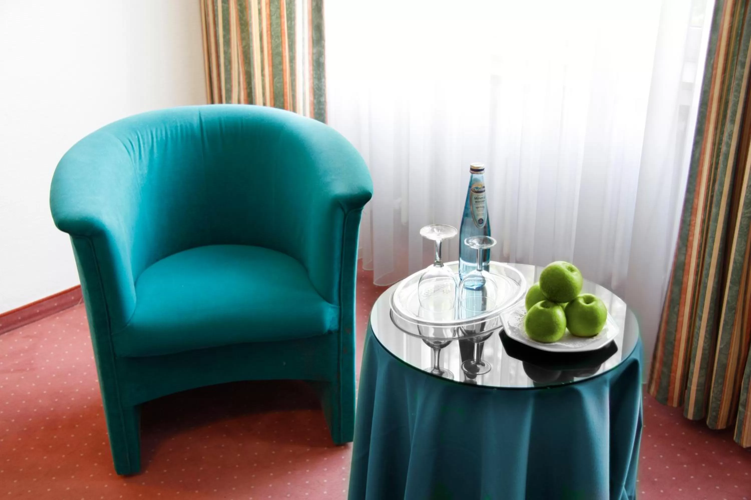 Seating area in INA Hotel Royal