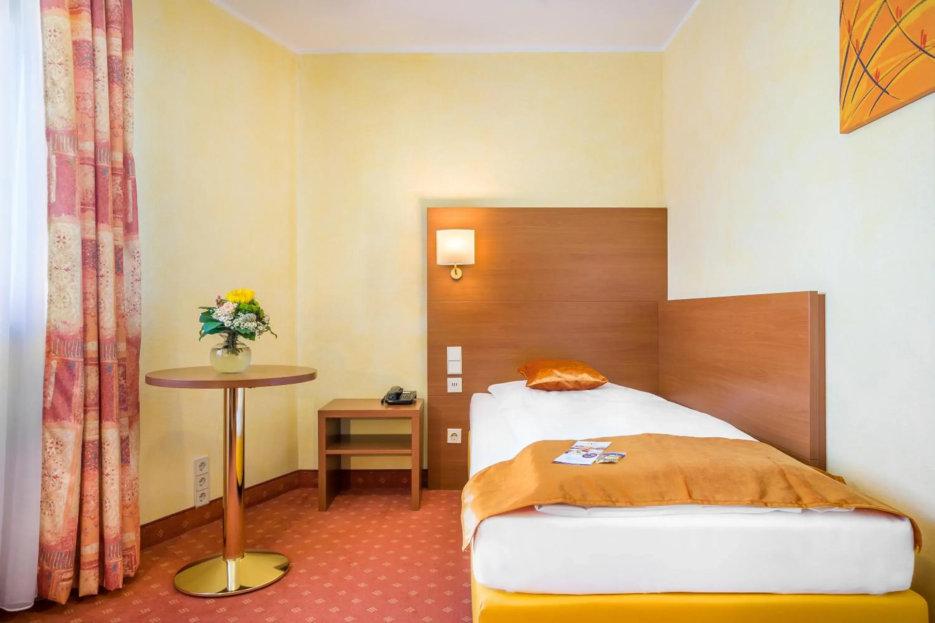 Photo of the whole room, Bed in Novum Hotel Rega Stuttgart