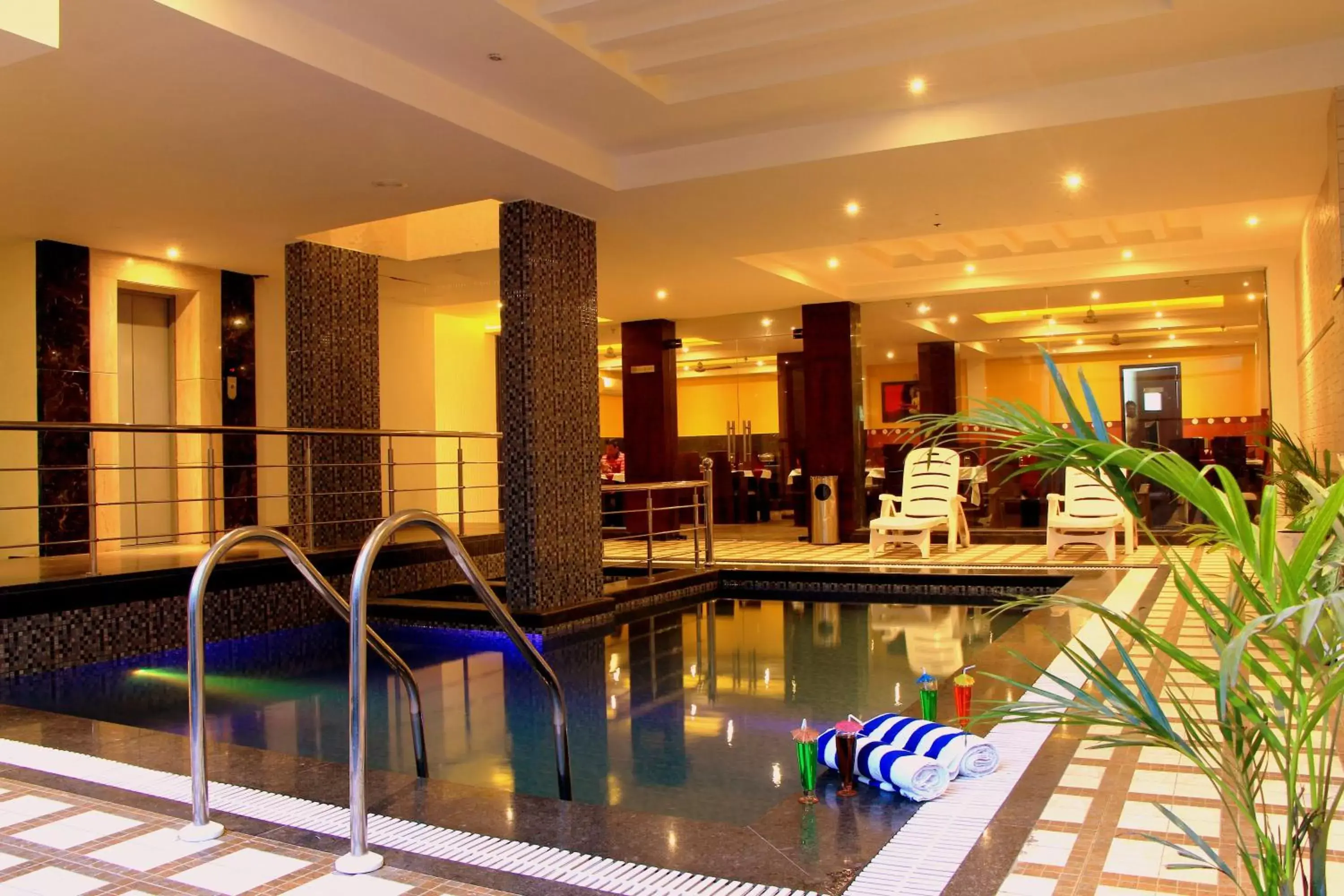 Seating area, Swimming Pool in Hotel Taj Villa- Agra