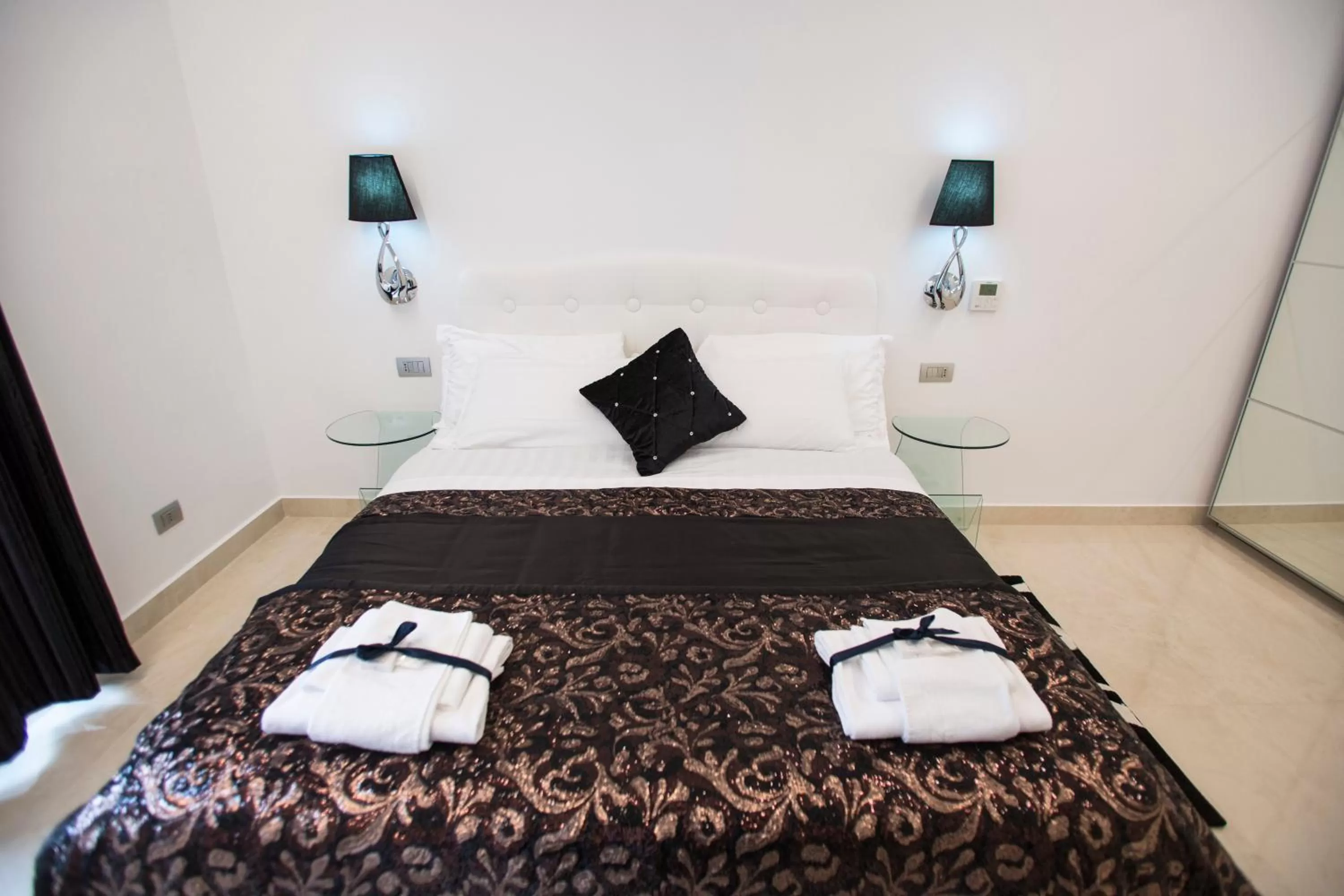 Bed in San Pietro Grand Suite