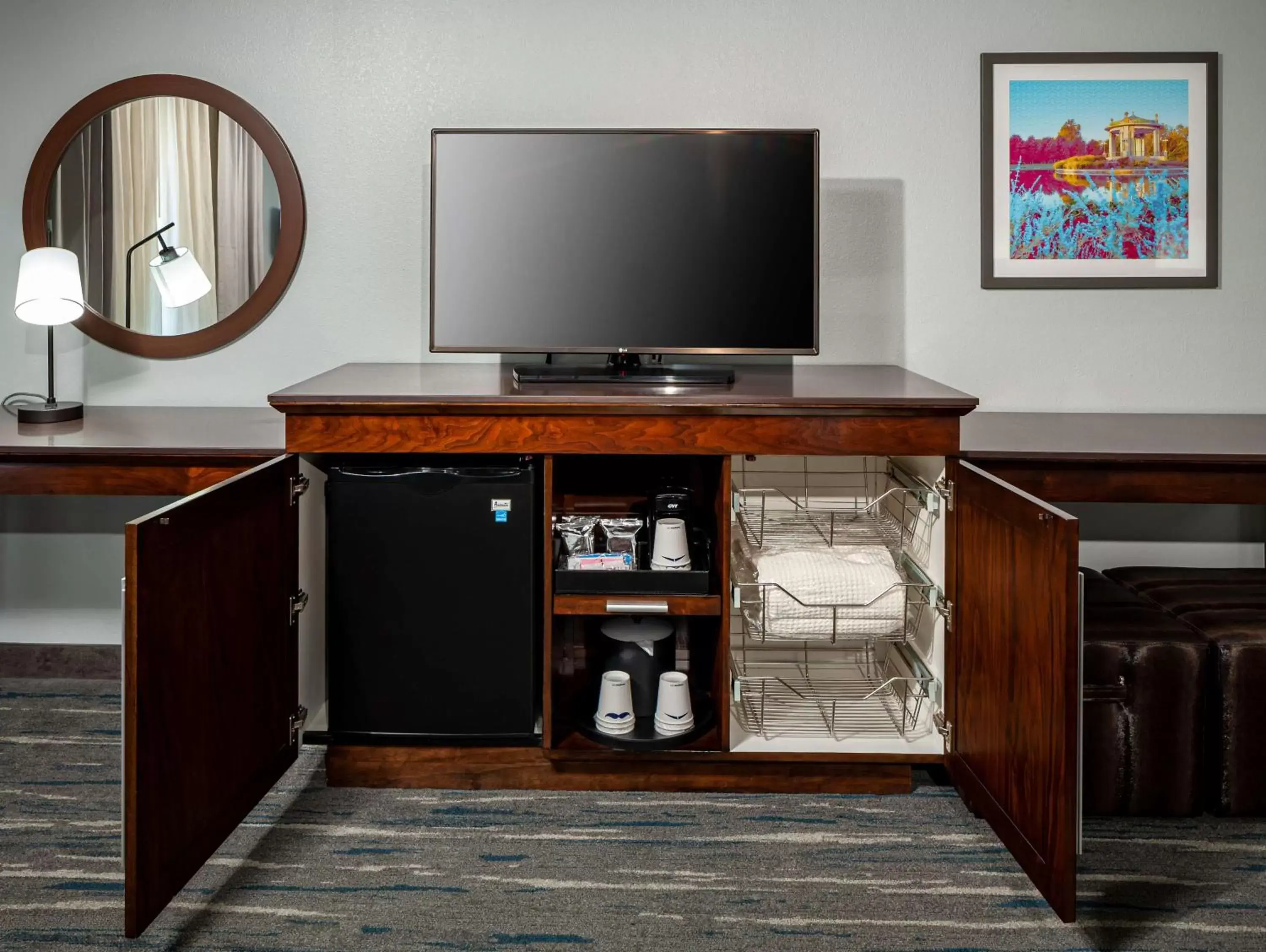 Photo of the whole room, TV/Entertainment Center in Hampton Inn & Suites St. Louis at Forest Park