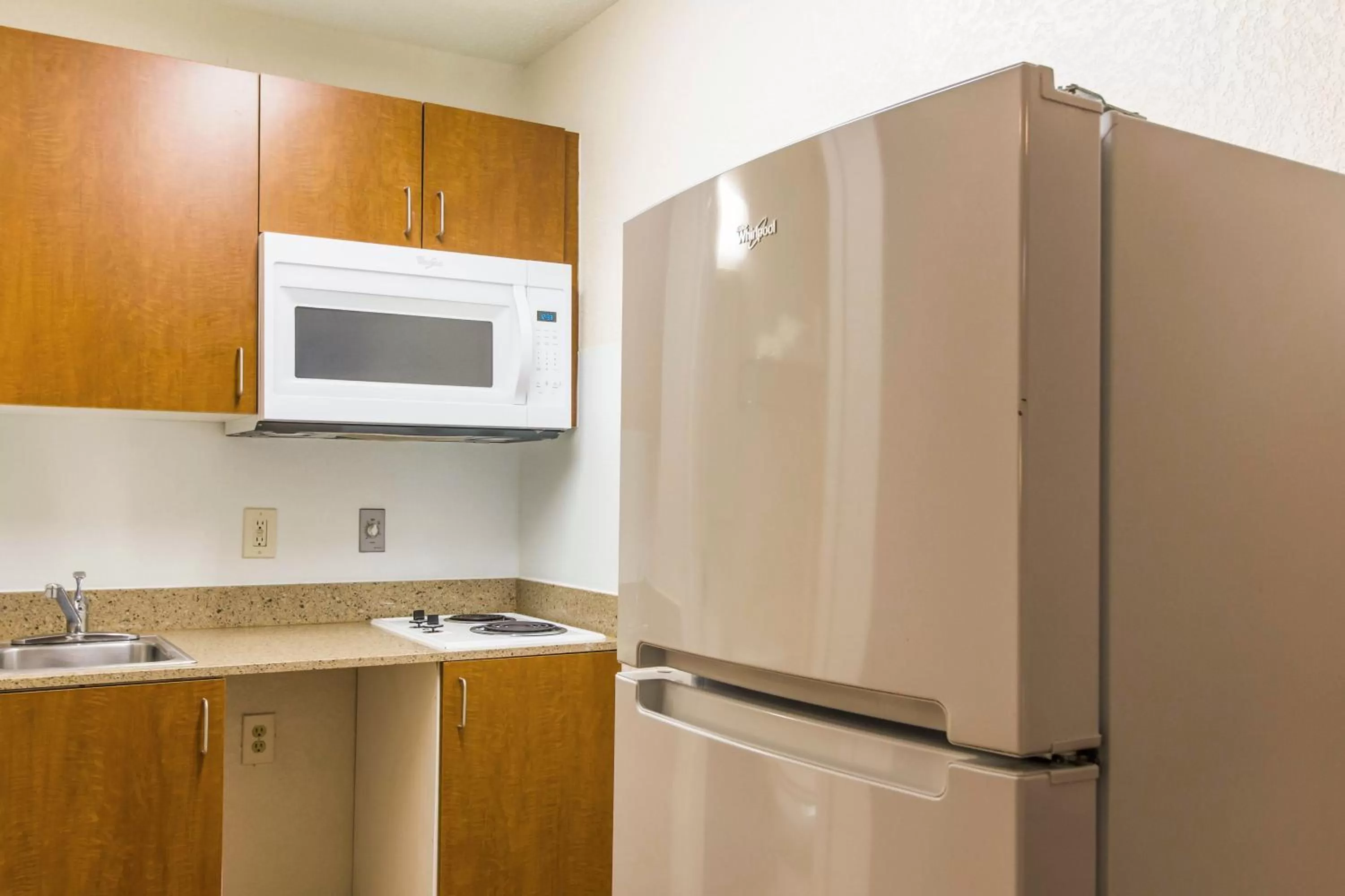 Photo of the whole room in HomeTowne Studios by Red Roof Houston - West Oaks - Energy Corridor