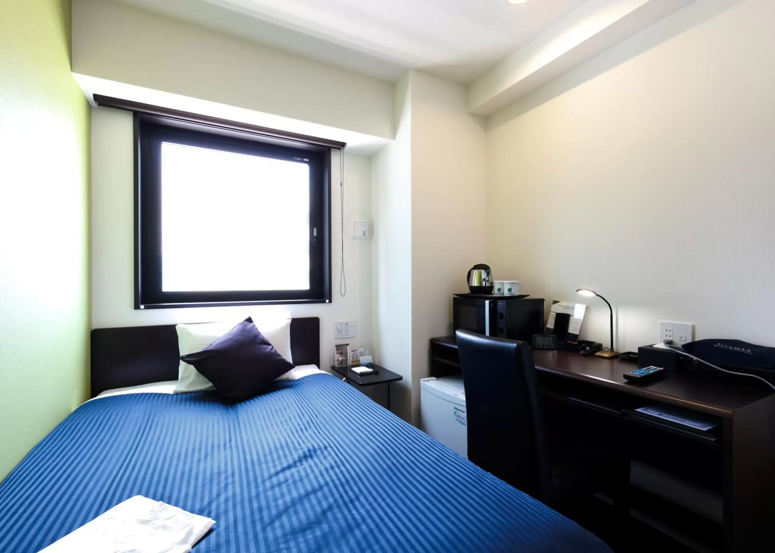 Bed in HOTEL LiVEMAX Ueno-Ekimae