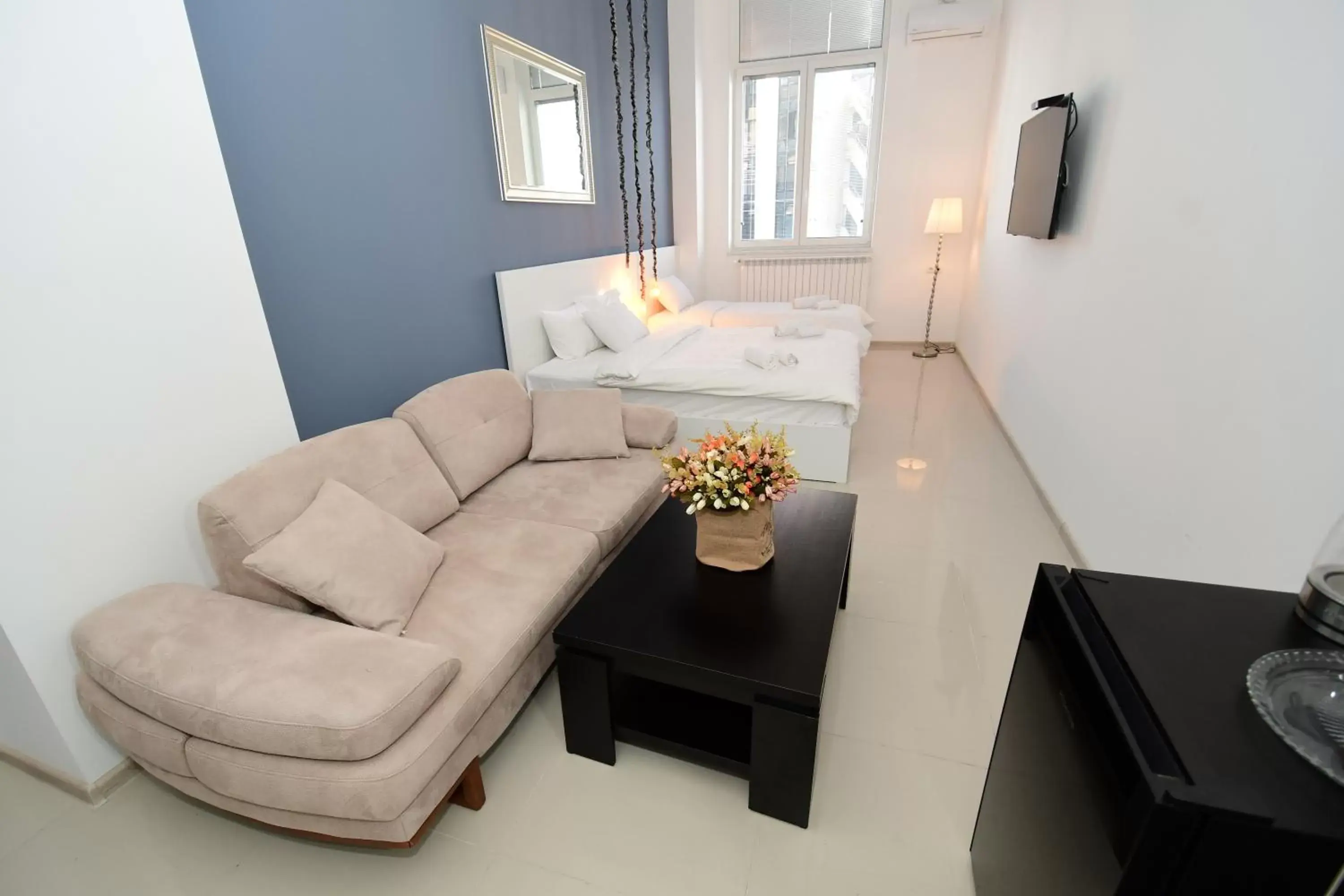 Bed, Seating Area in Super Luxury Apartments