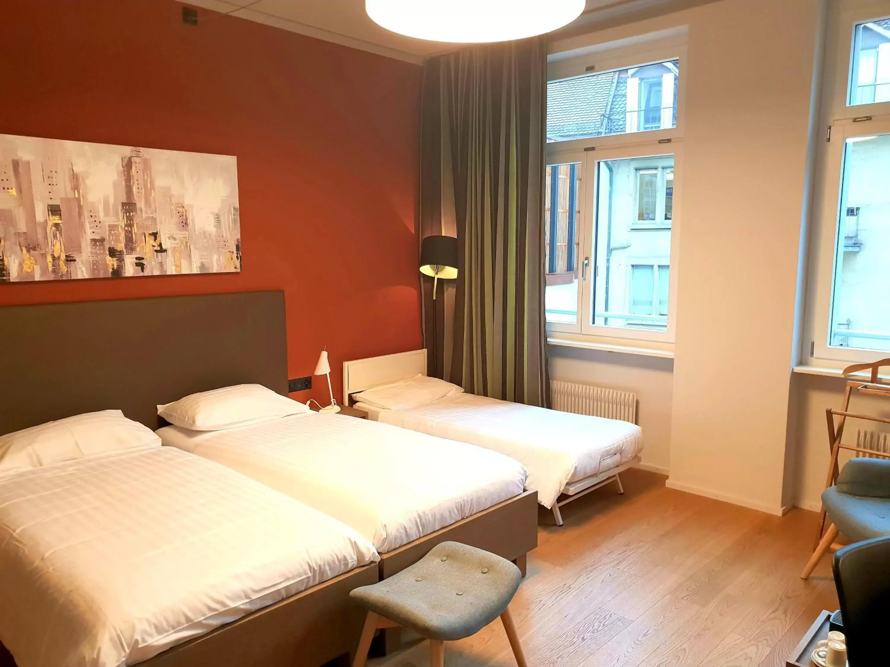 Photo of the whole room, Bed in Hotel Bären am Bundesplatz
