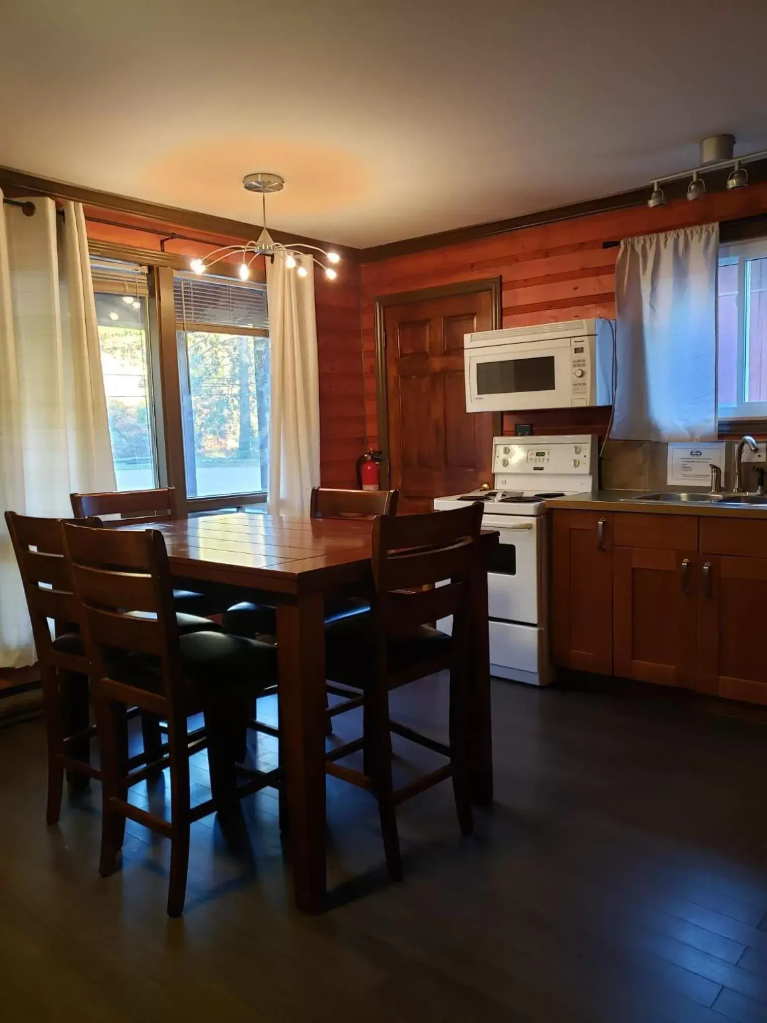 Living room, Dining Area in Hush Lodge and Cottages