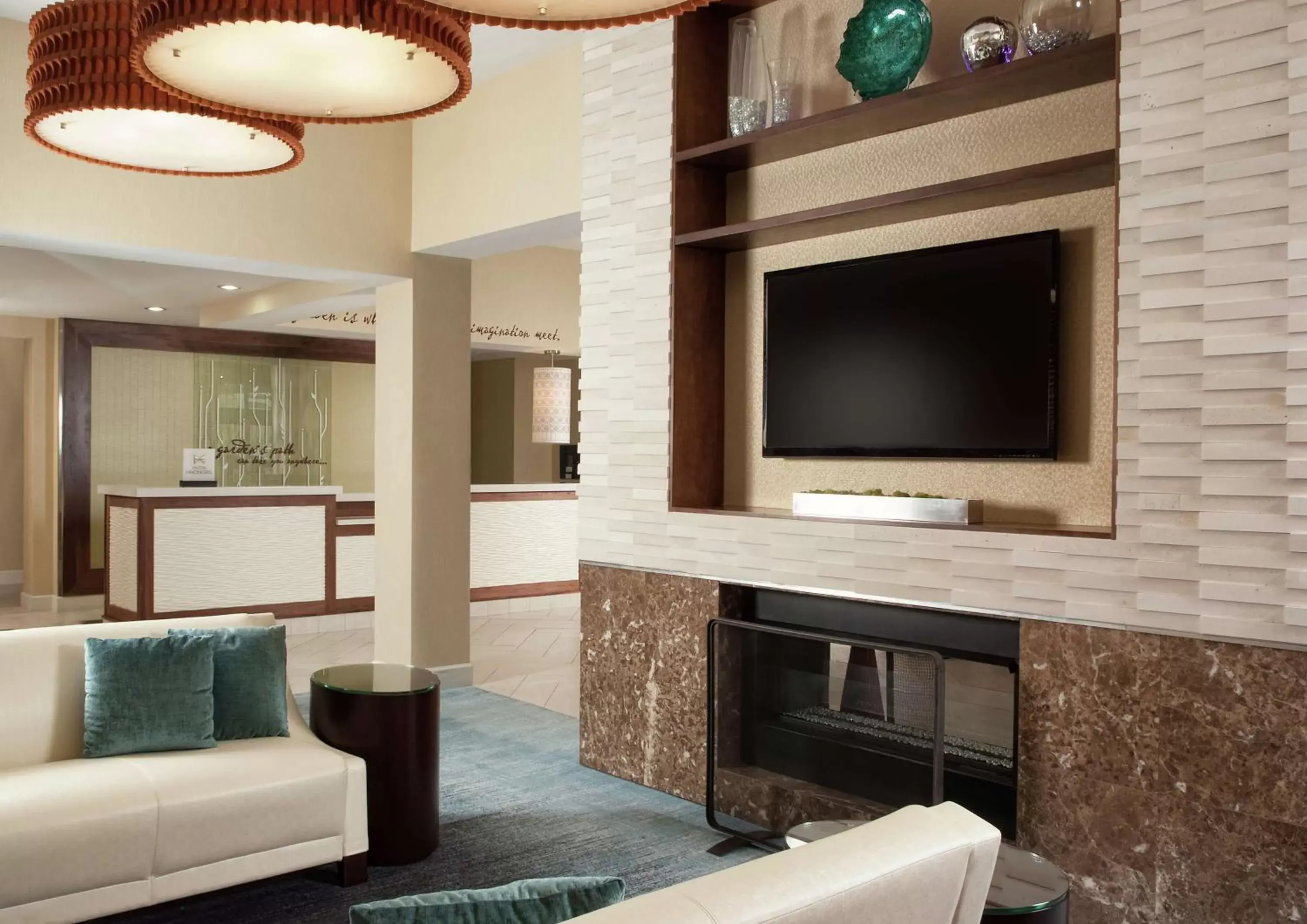 Lobby or reception, TV/Entertainment Center in Hilton Garden Inn Orlando Airport