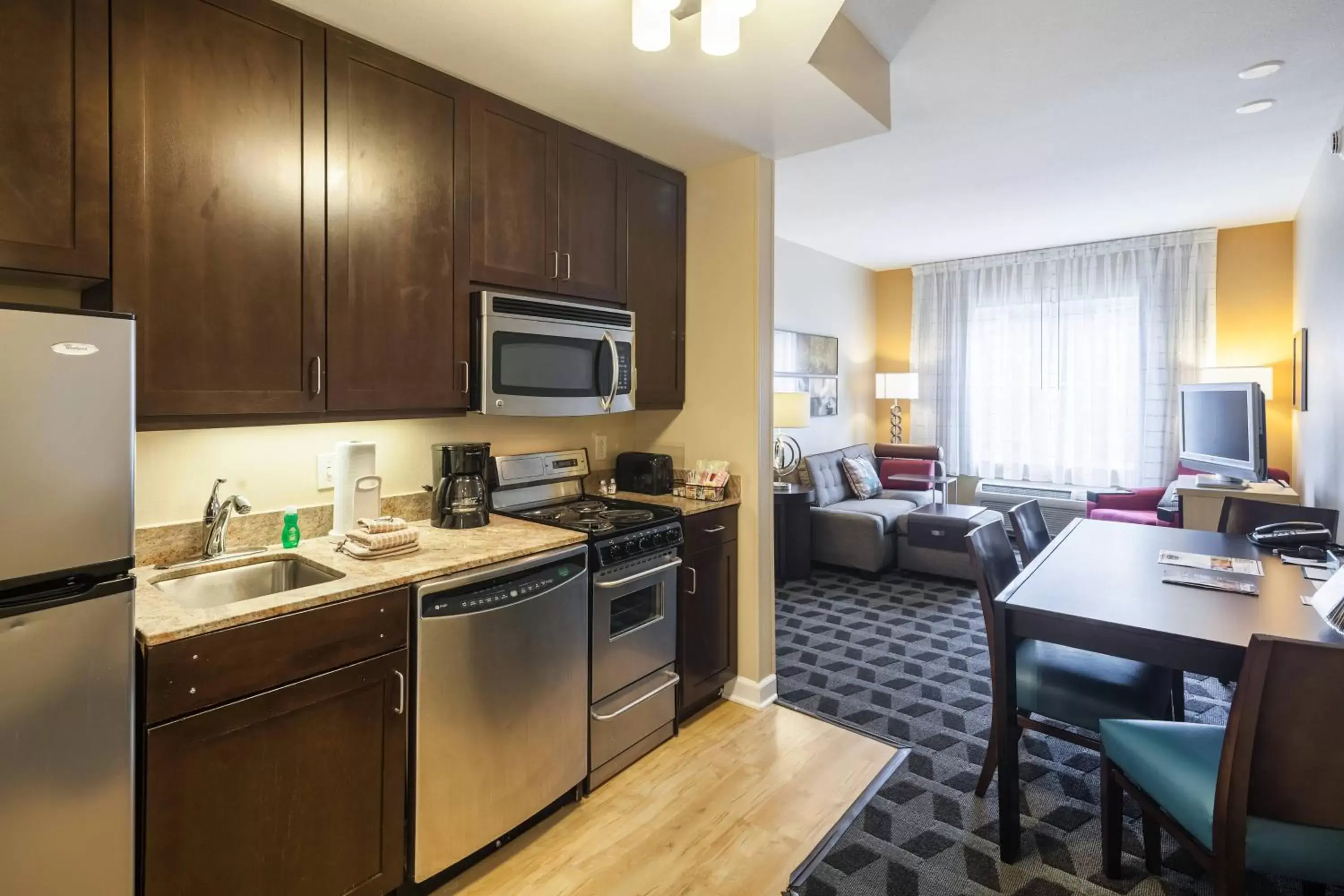 Bedroom, Kitchen/Kitchenette in TownePlace Suites Jacksonville Butler Boulevard