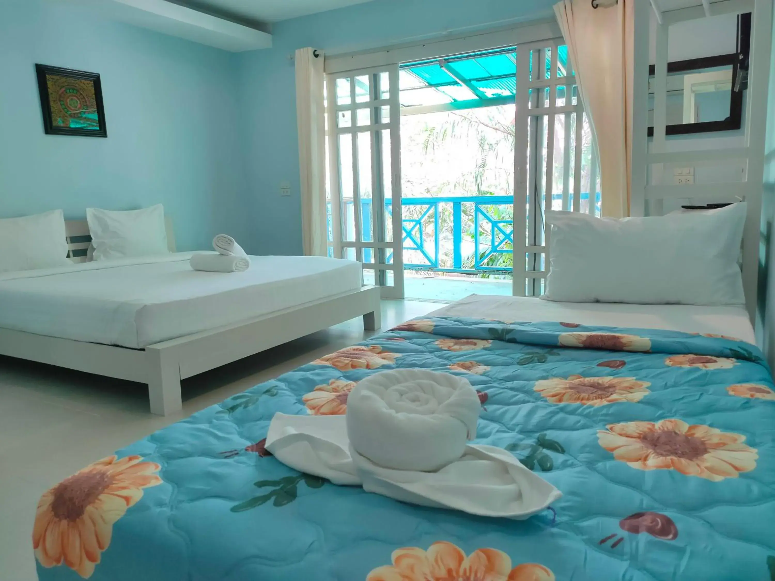 Bed in Banana Beach Resort