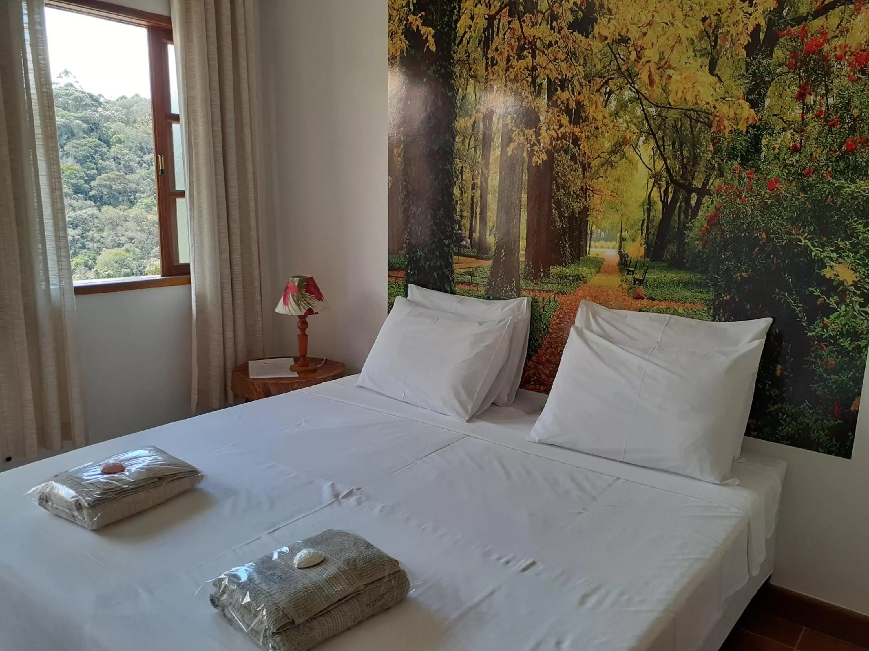 Bed in Pousada R.N.C. Nosso Paraíso