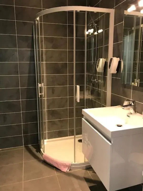 Bathroom in Logis Hôtel Les Coudercous