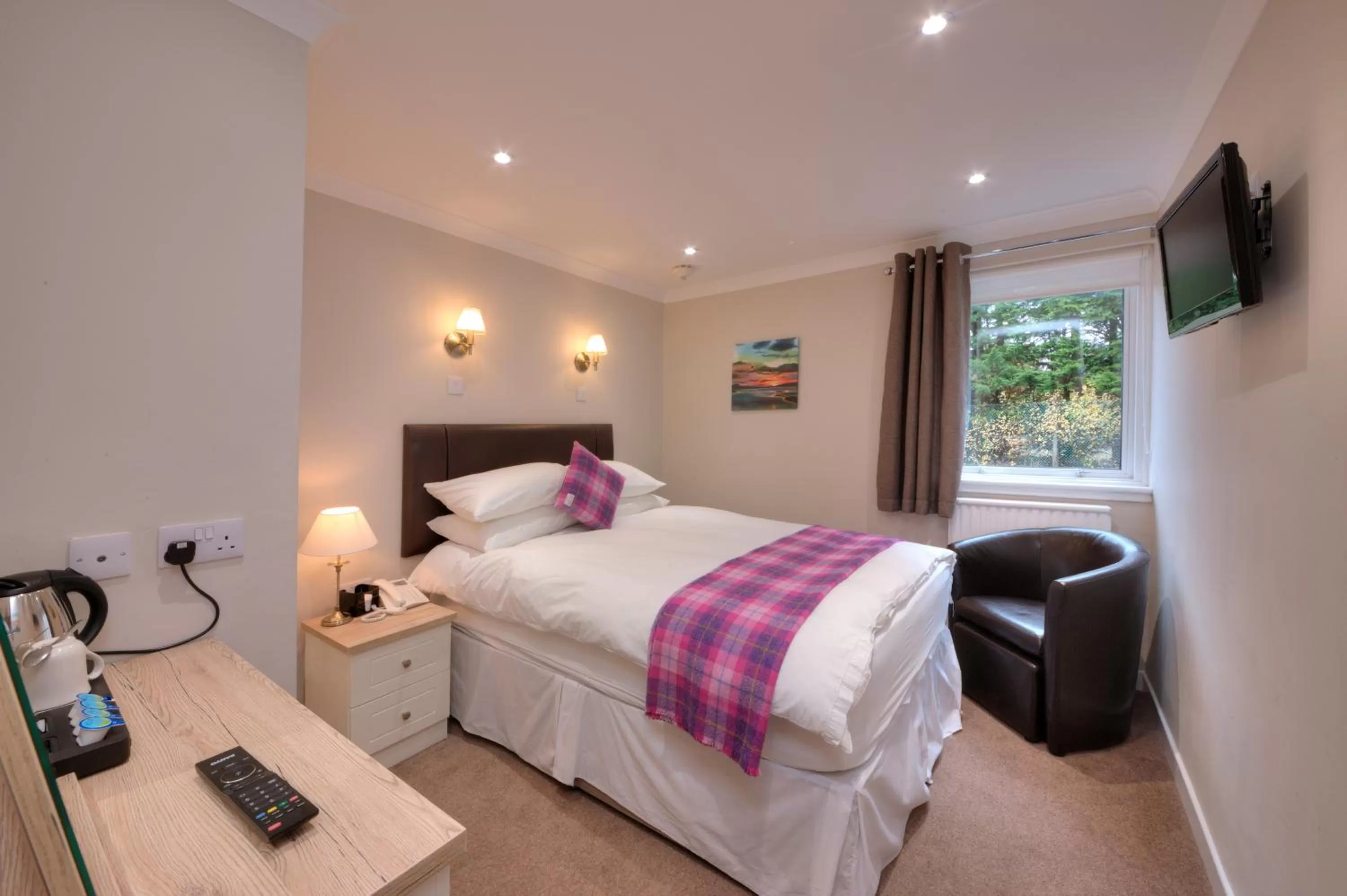 Photo of the whole room, Bed in Falls of Lora Hotel