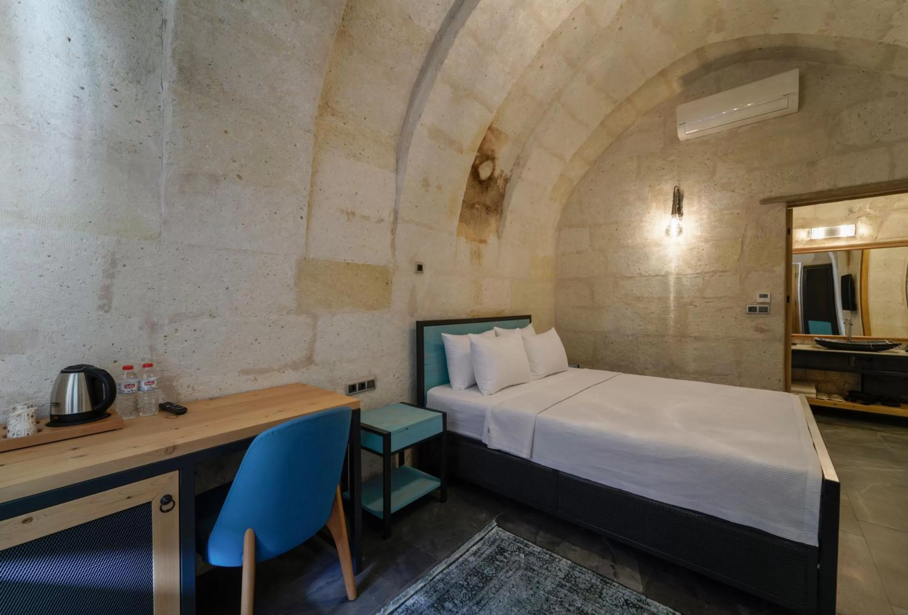 Bed in The Niche Cave Hotel