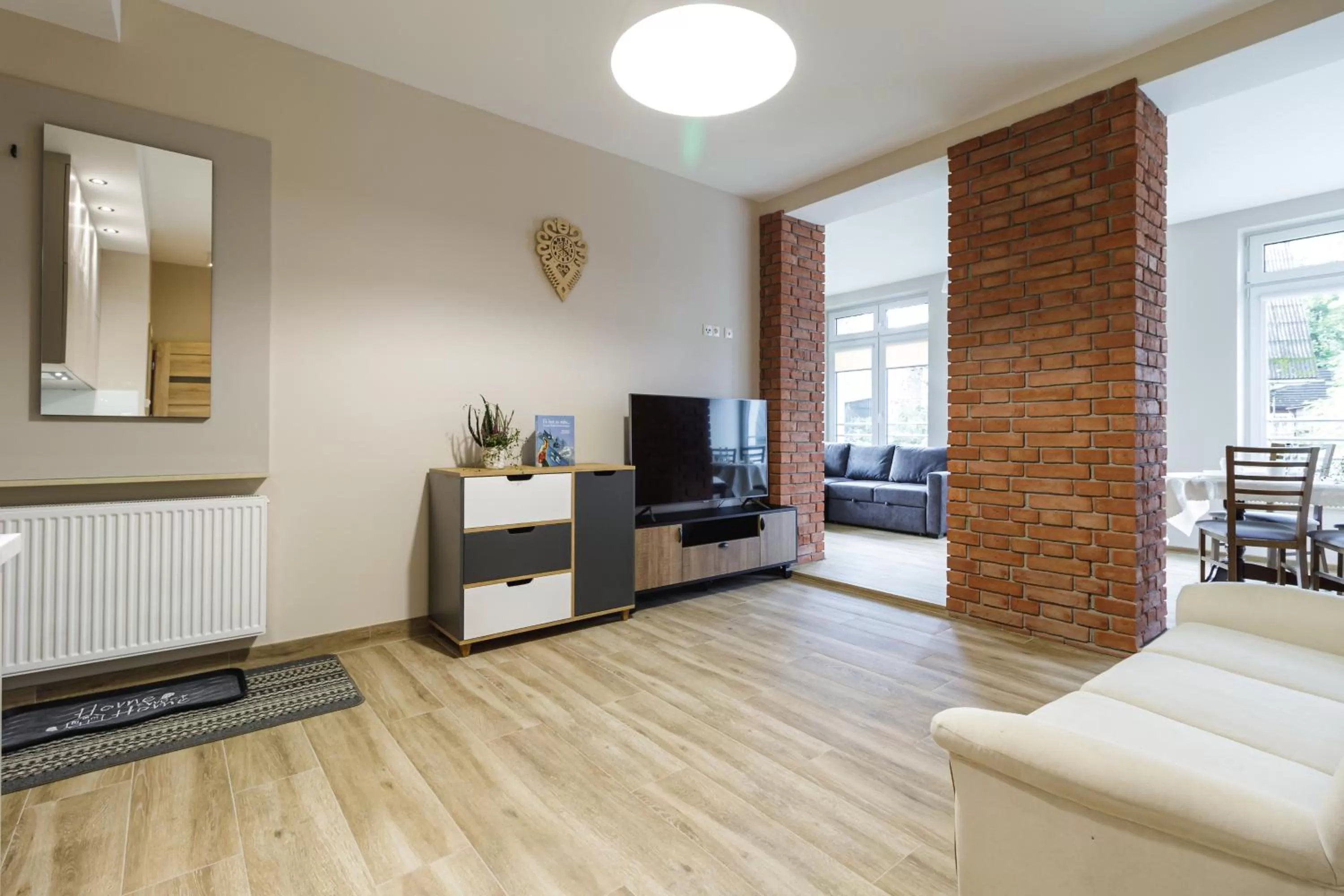 Communal lounge/ TV room, TV/Entertainment Center in Jagiellońska Residence