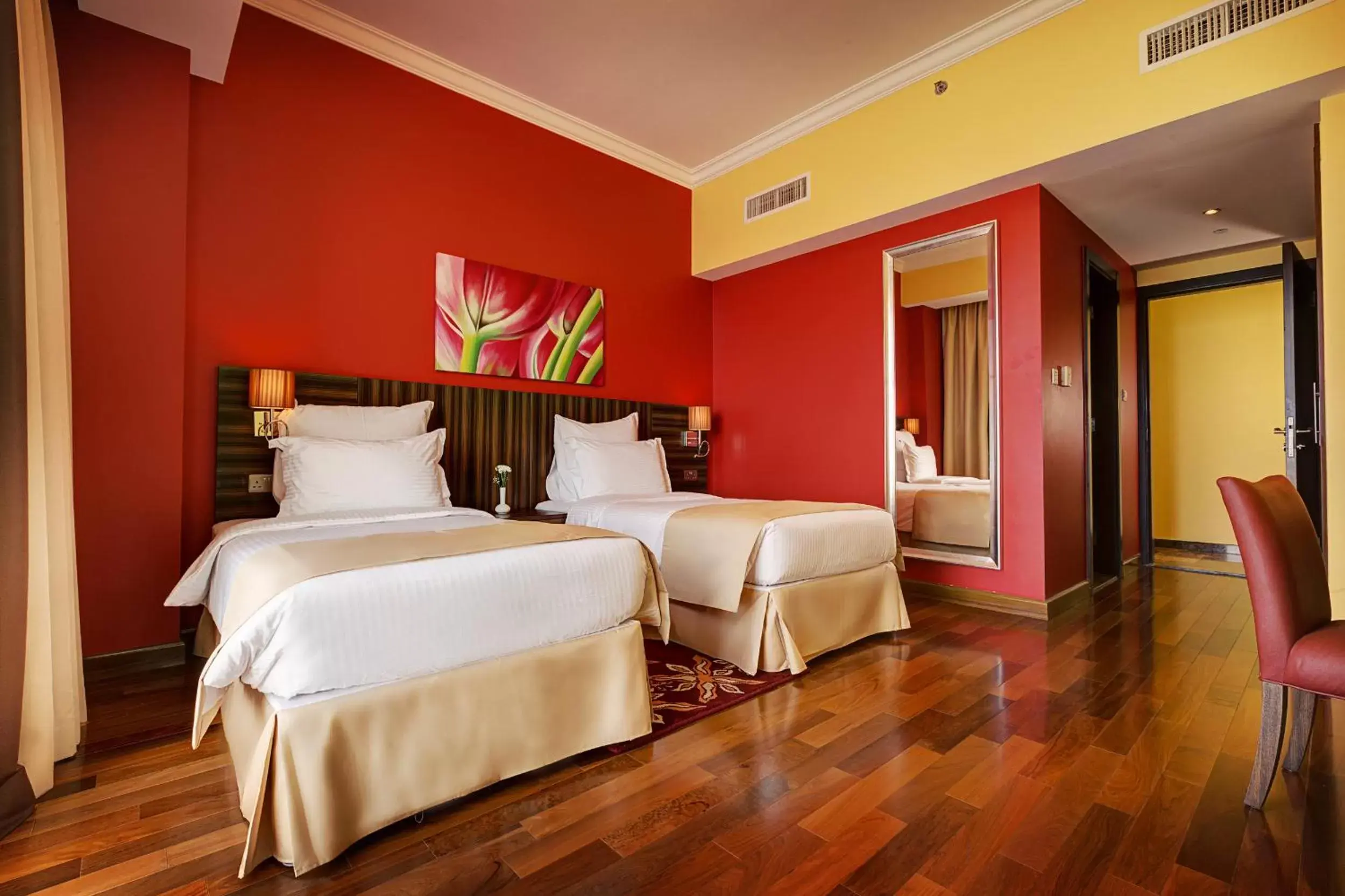 Bed in Abidos Hotel Apartment Dubai Land