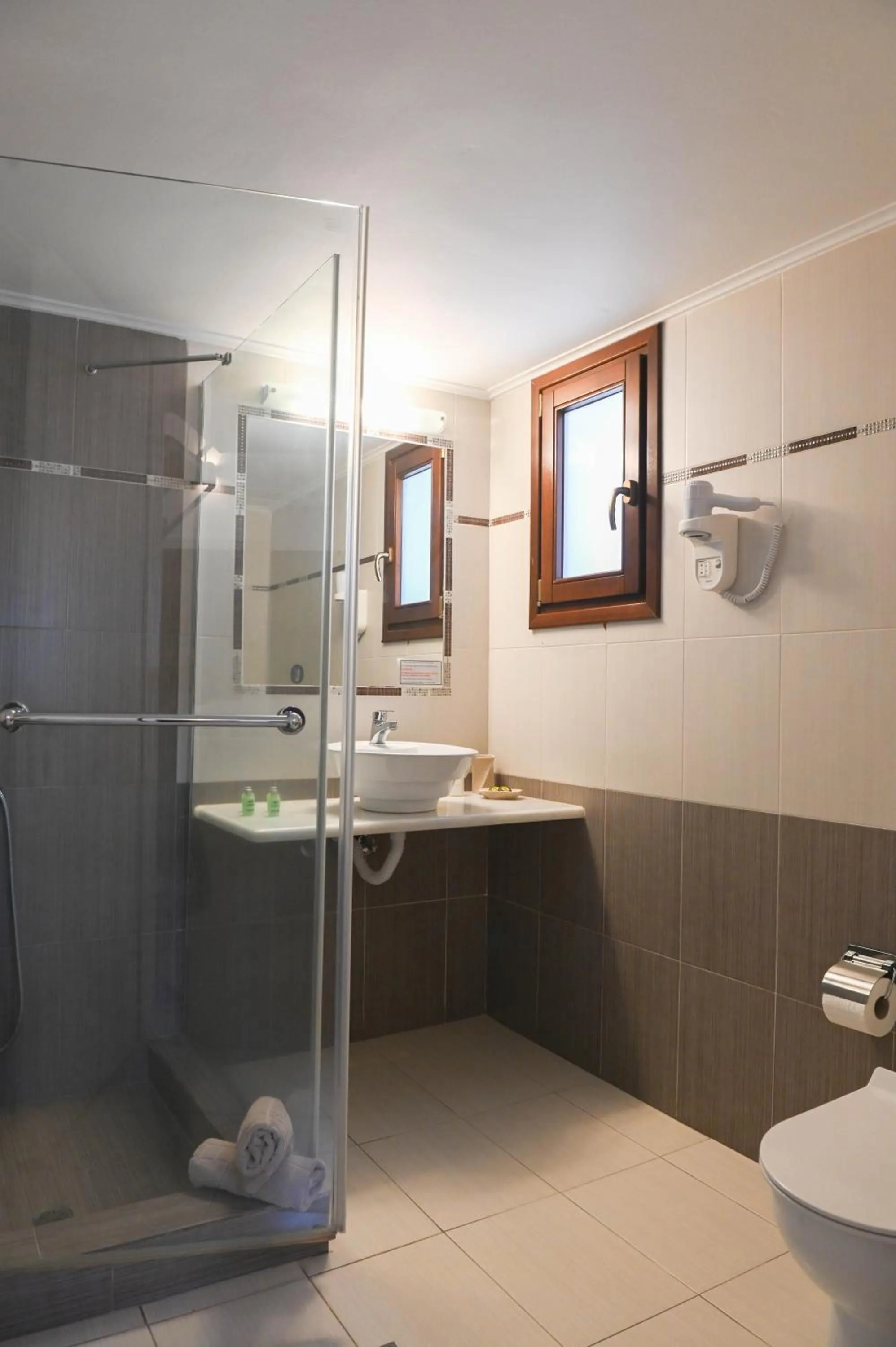 Bathroom in Amerisa Suites & Villa