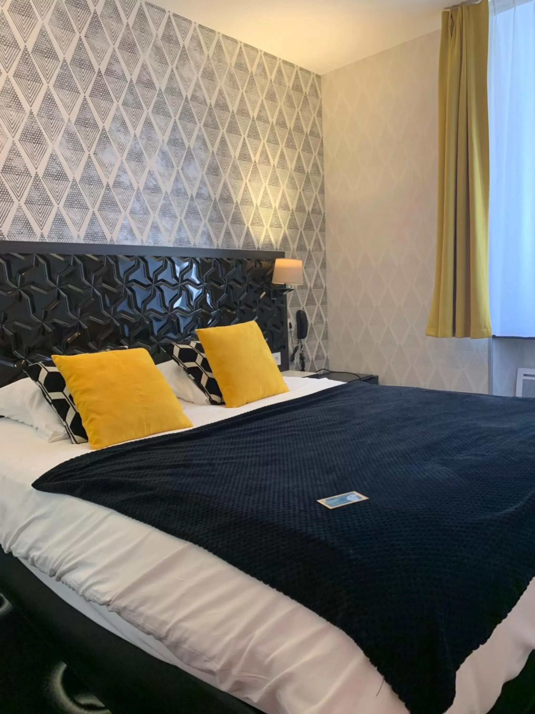 Bed in Ambassadeur Hotel - Cherbourg Port de Plaisance