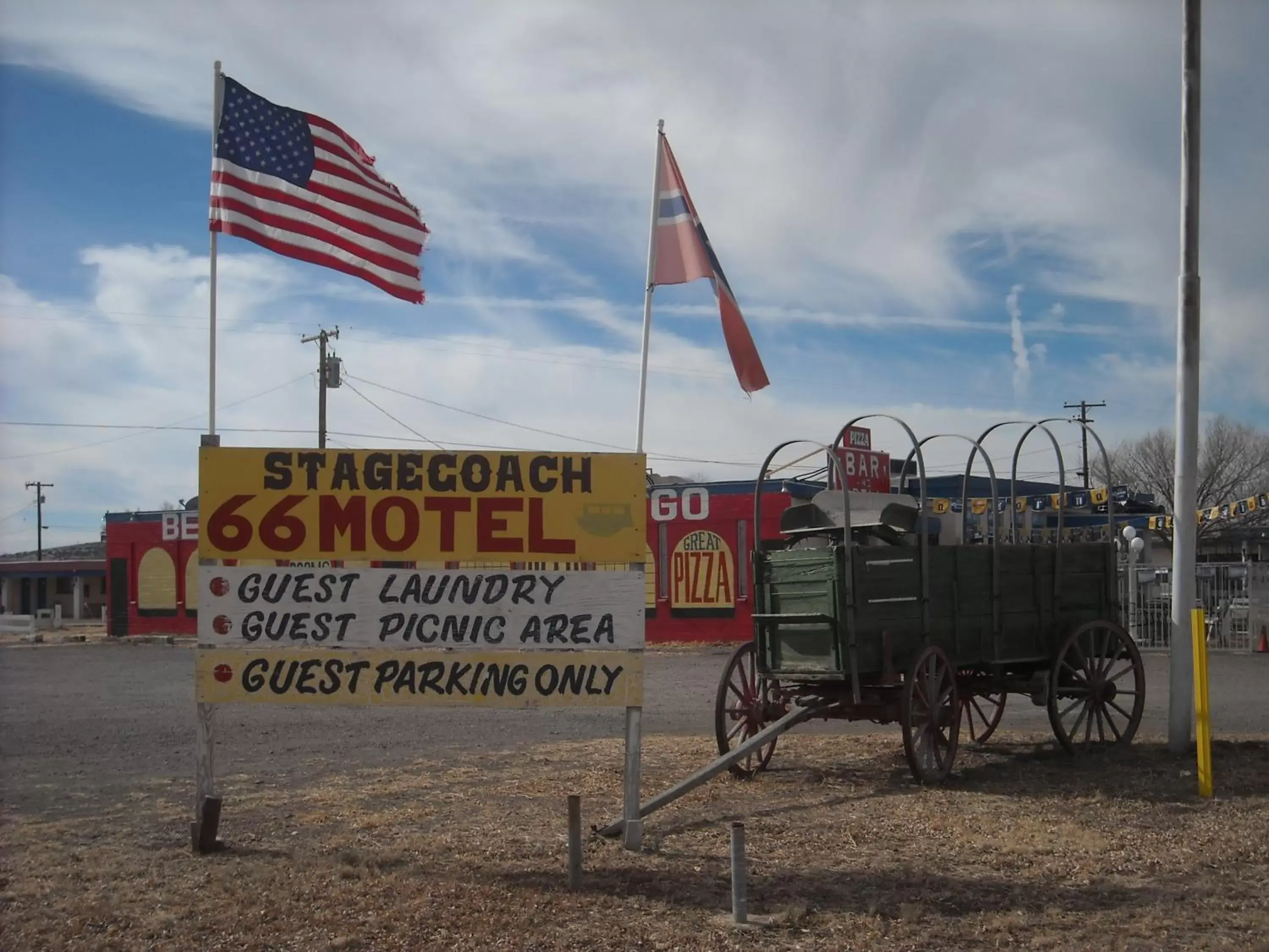 Property logo or sign in Stagecoach 66 Motel