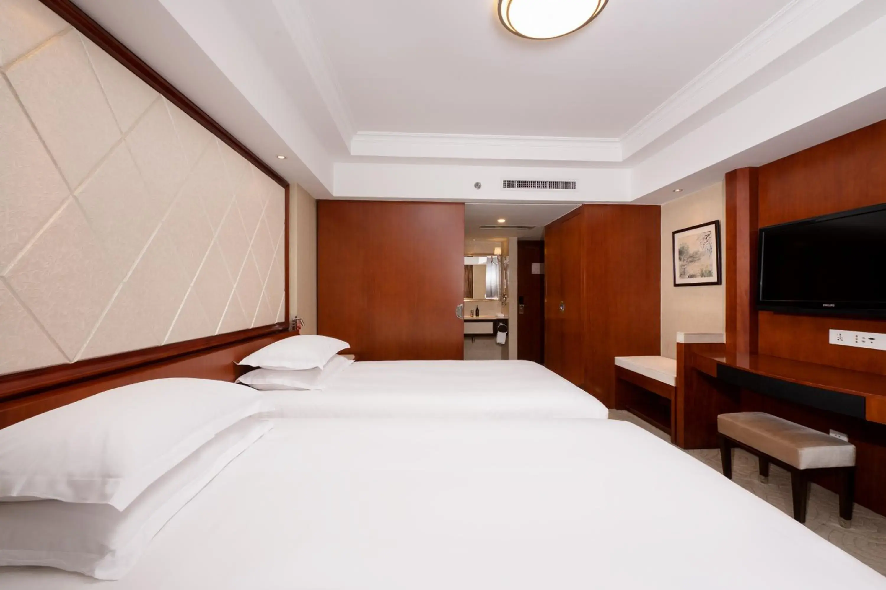 Bed in Xinqiao Hotel