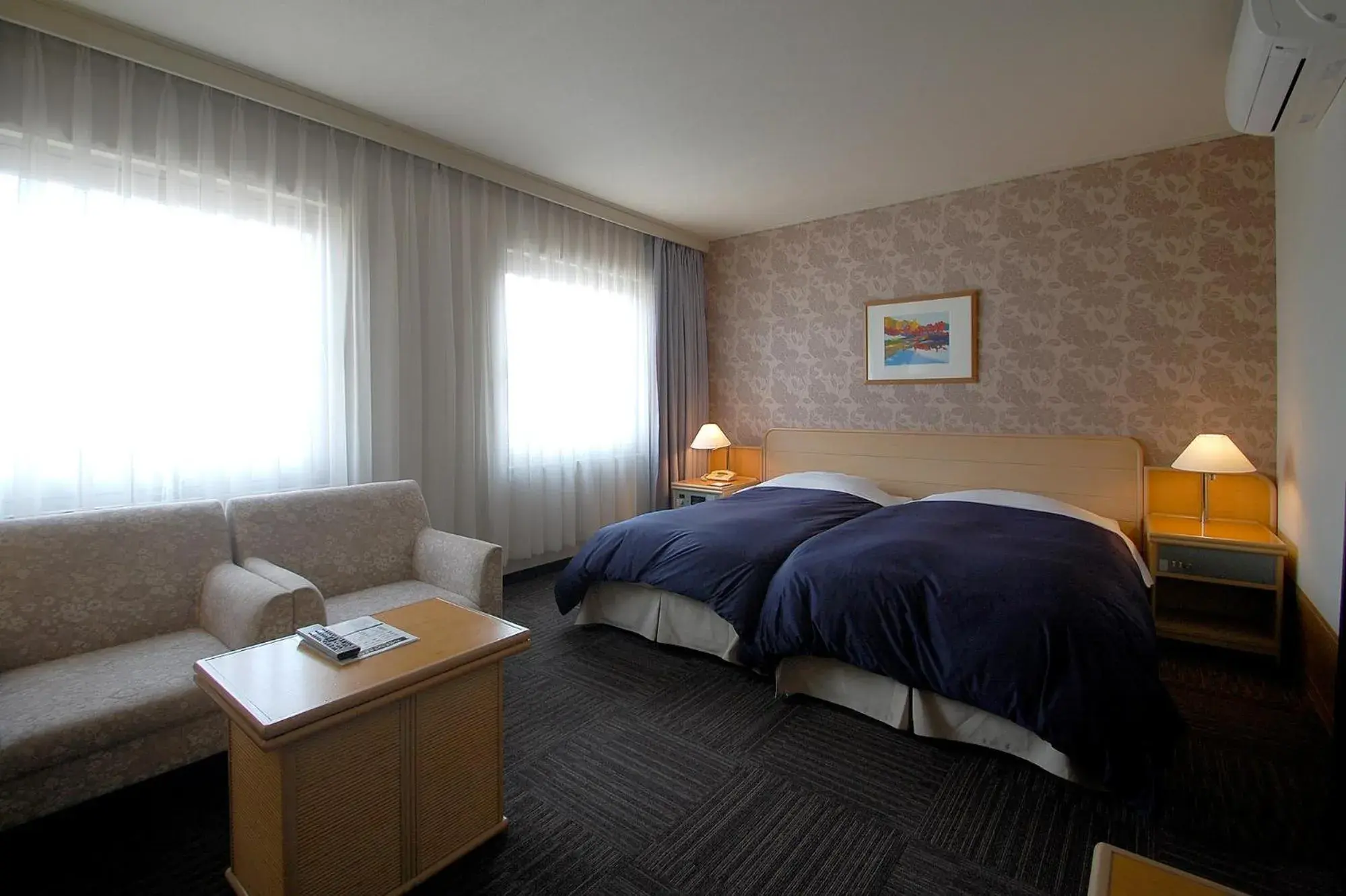 Bed in Hotel Excel Okayama