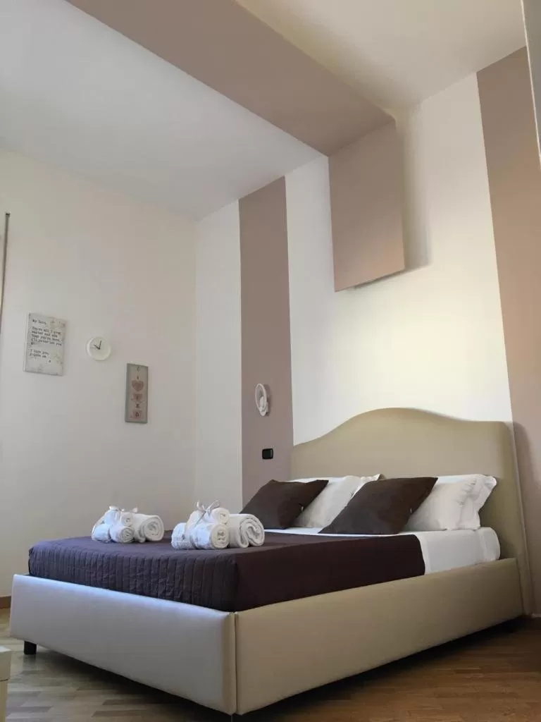 Bed in Maison Arena Bovio