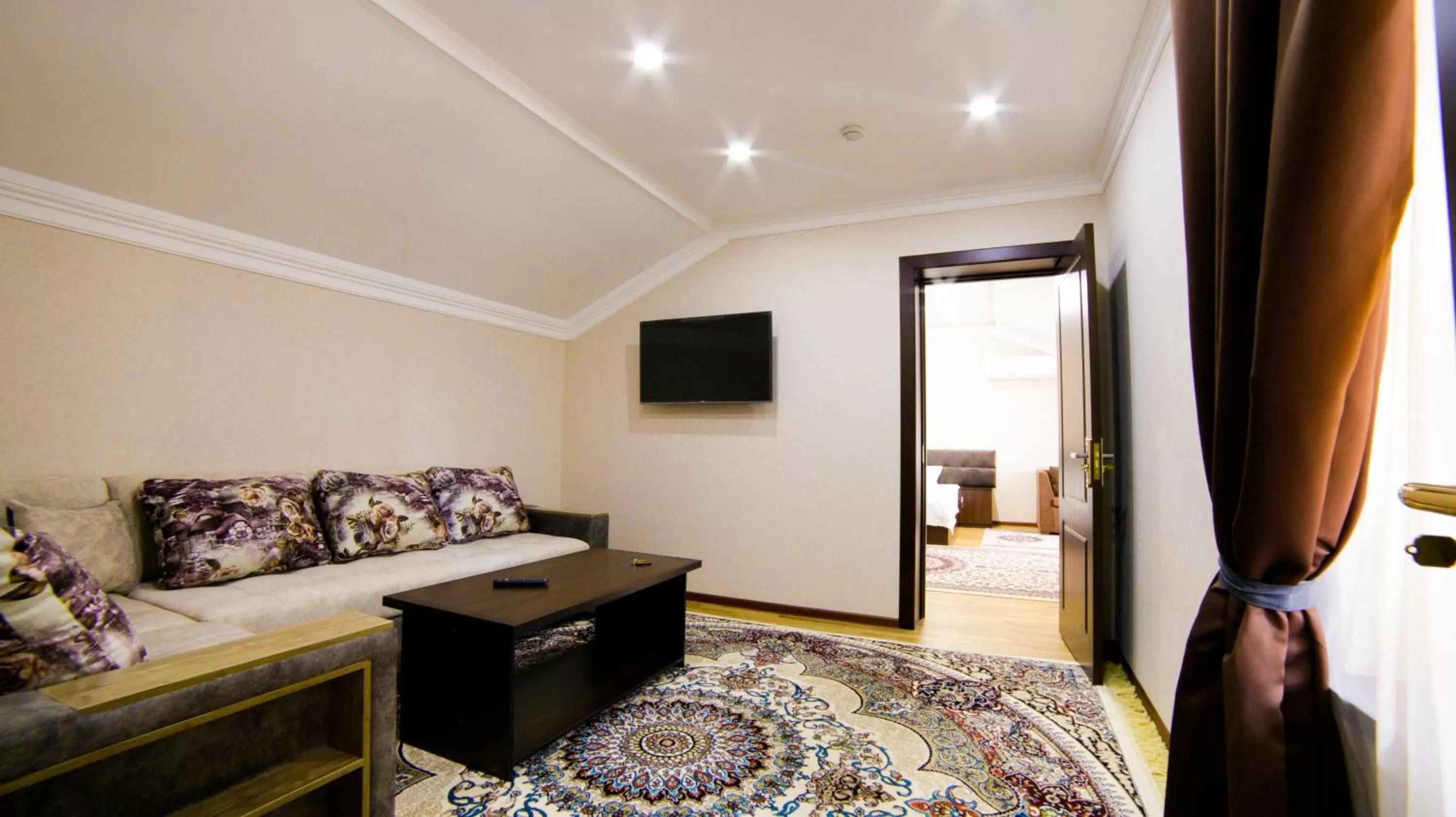 Seating area, Bed in Alliance Hotel Tashkent