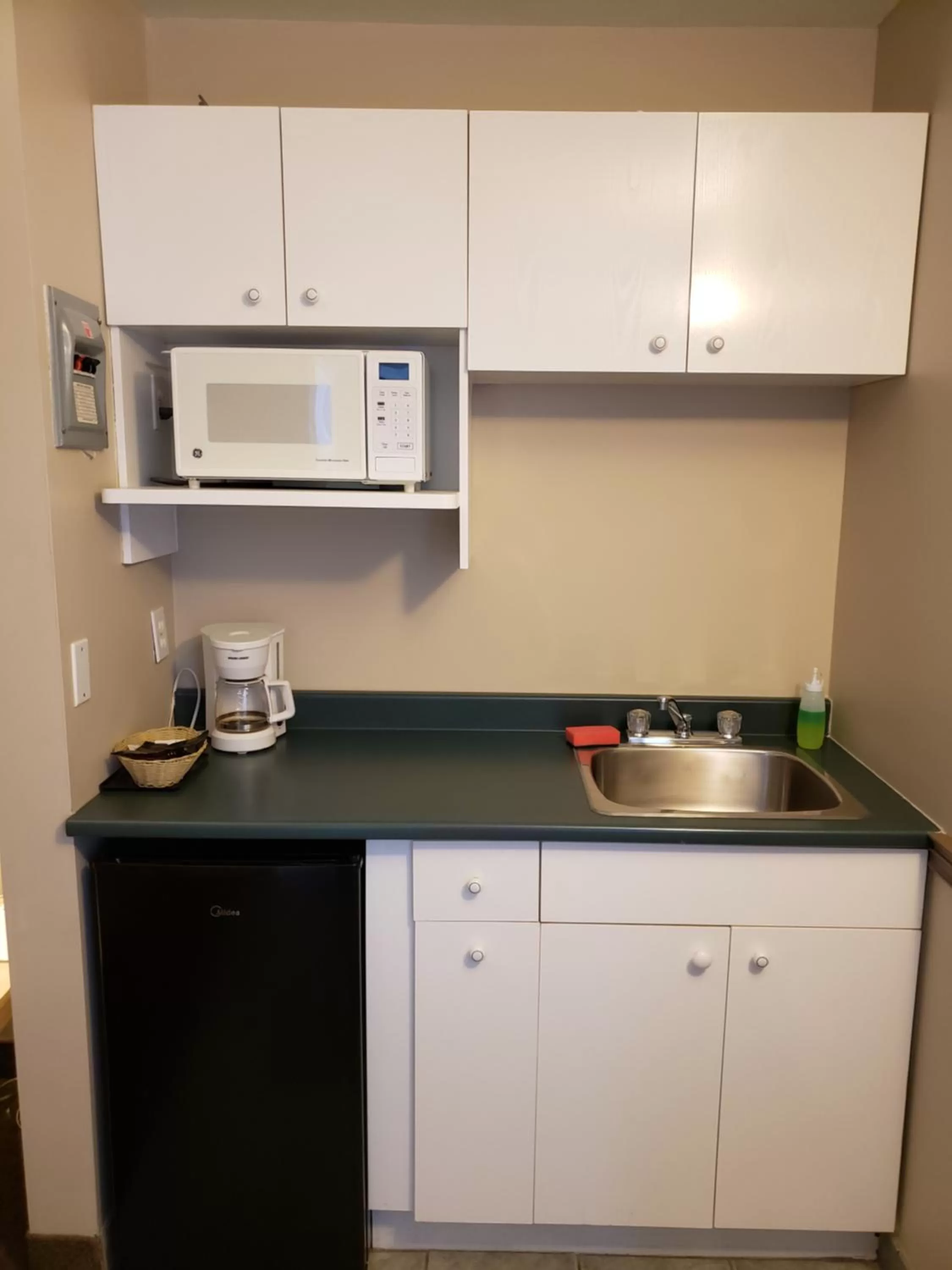 Kitchen or kitchenette in Shemron Suites Hotel