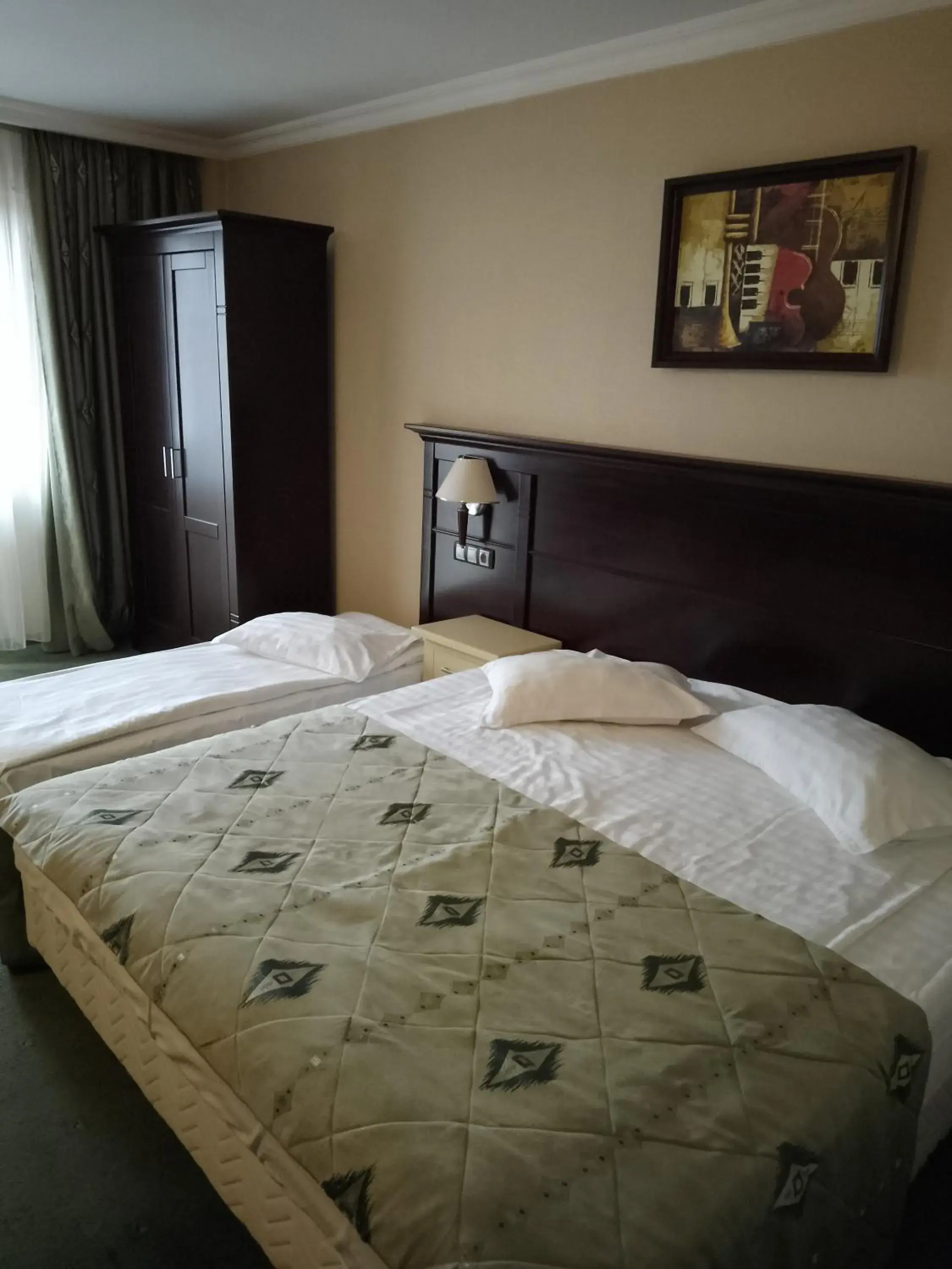Bed in Hotel Rapsodia City Center