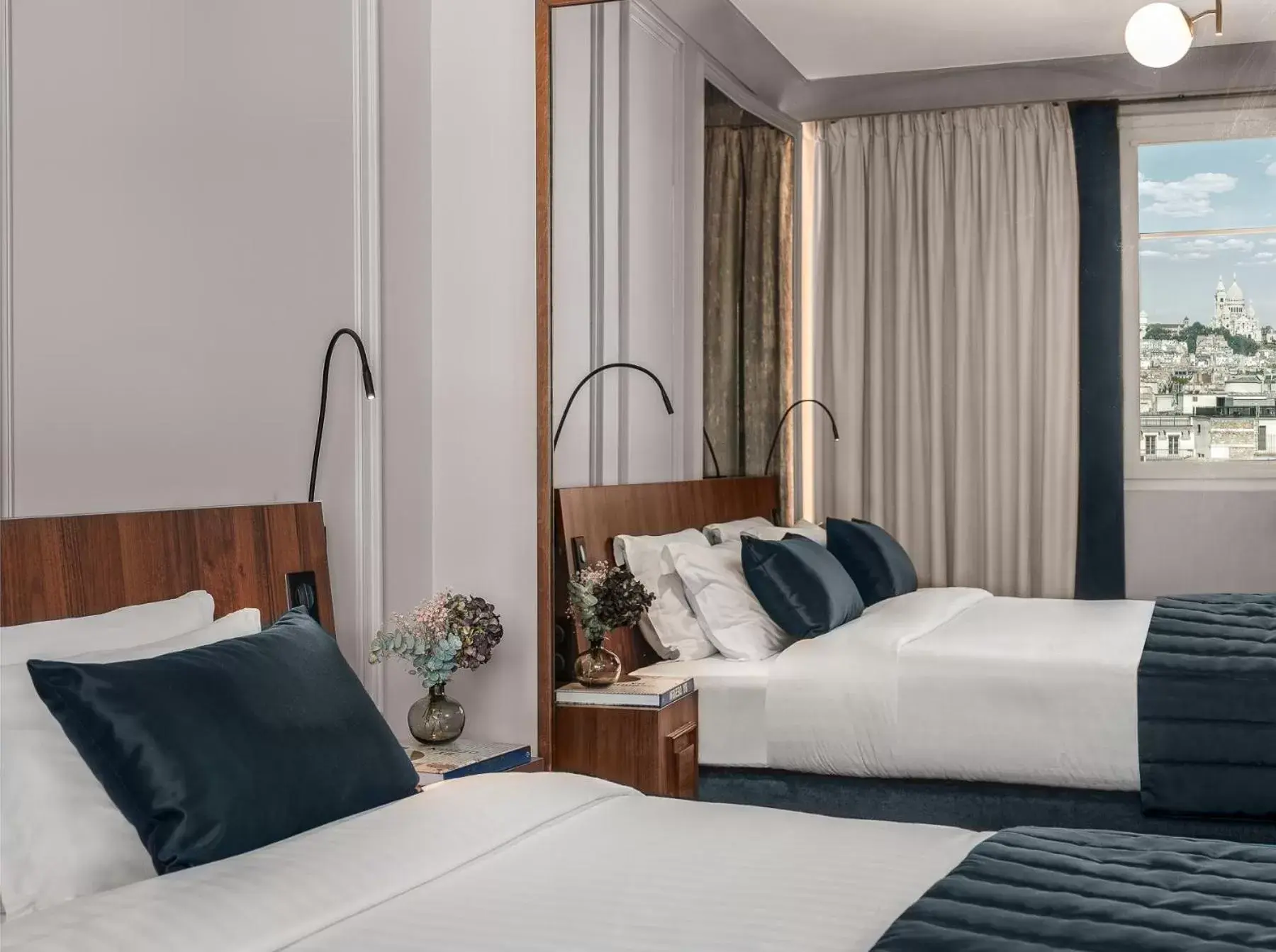 Landmark view, Bed in M Social Hotel Paris Opera Landmark view, Bed in M Social Hotel Paris Opera