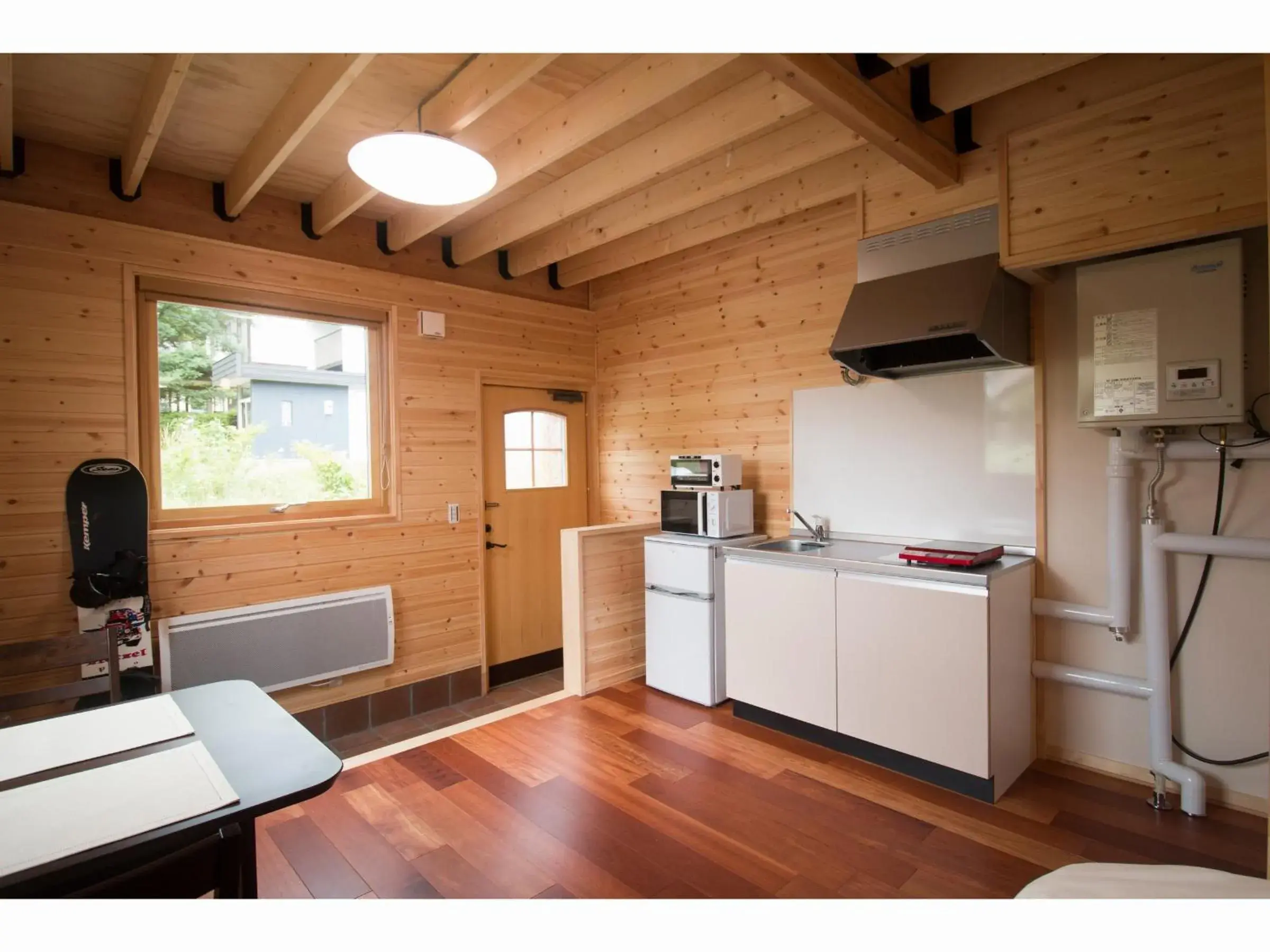 Kitchen/Kitchenette in Brick House Furano