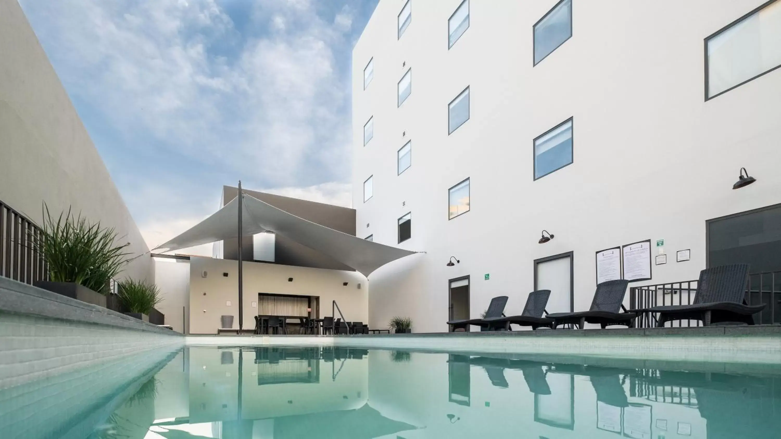 Swimming pool, Property Building in Staybridge Suites - Villahermosa Tabasco, an IHG Hotel