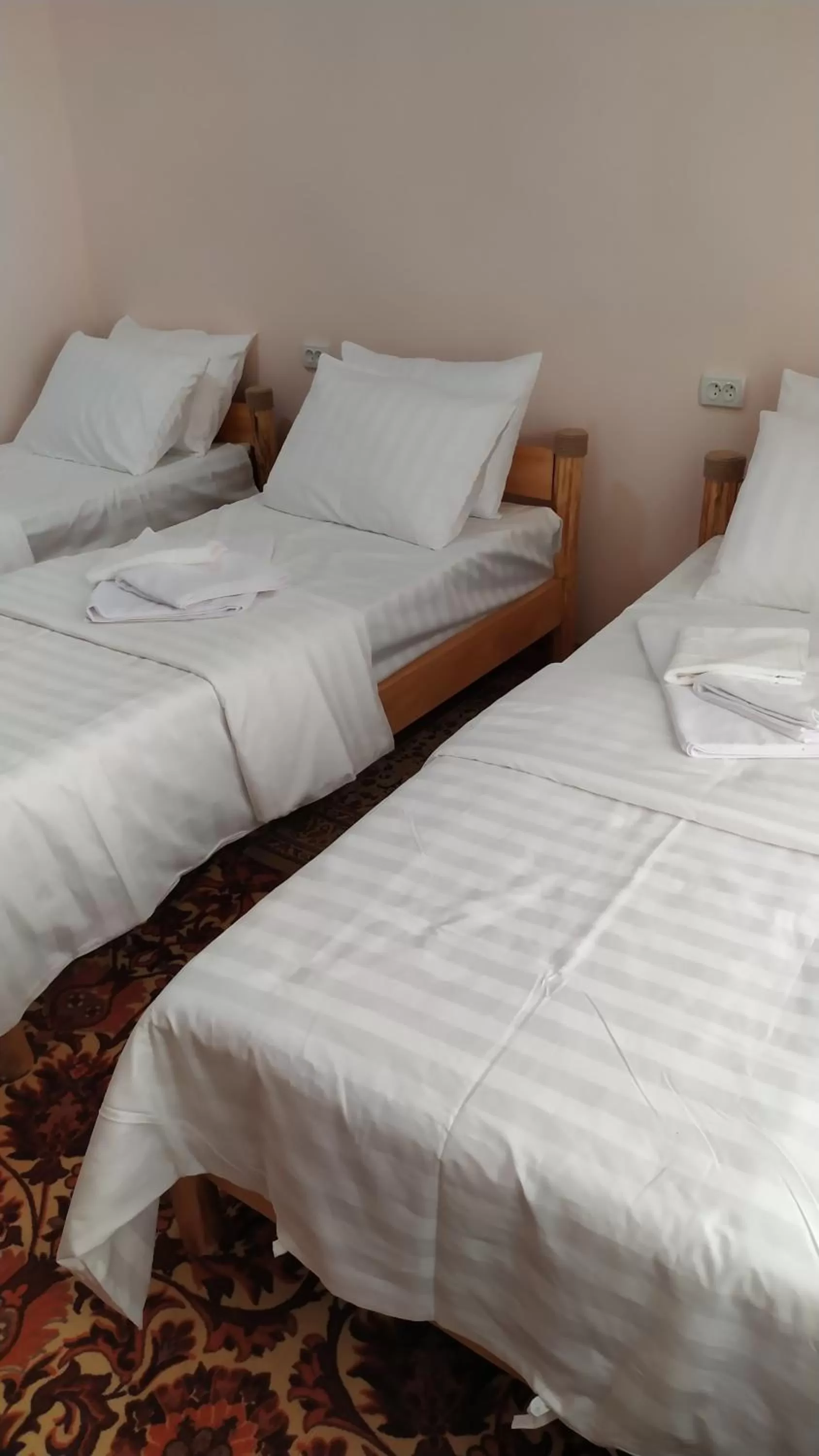 Bed in Alisher B&B Chorbog'