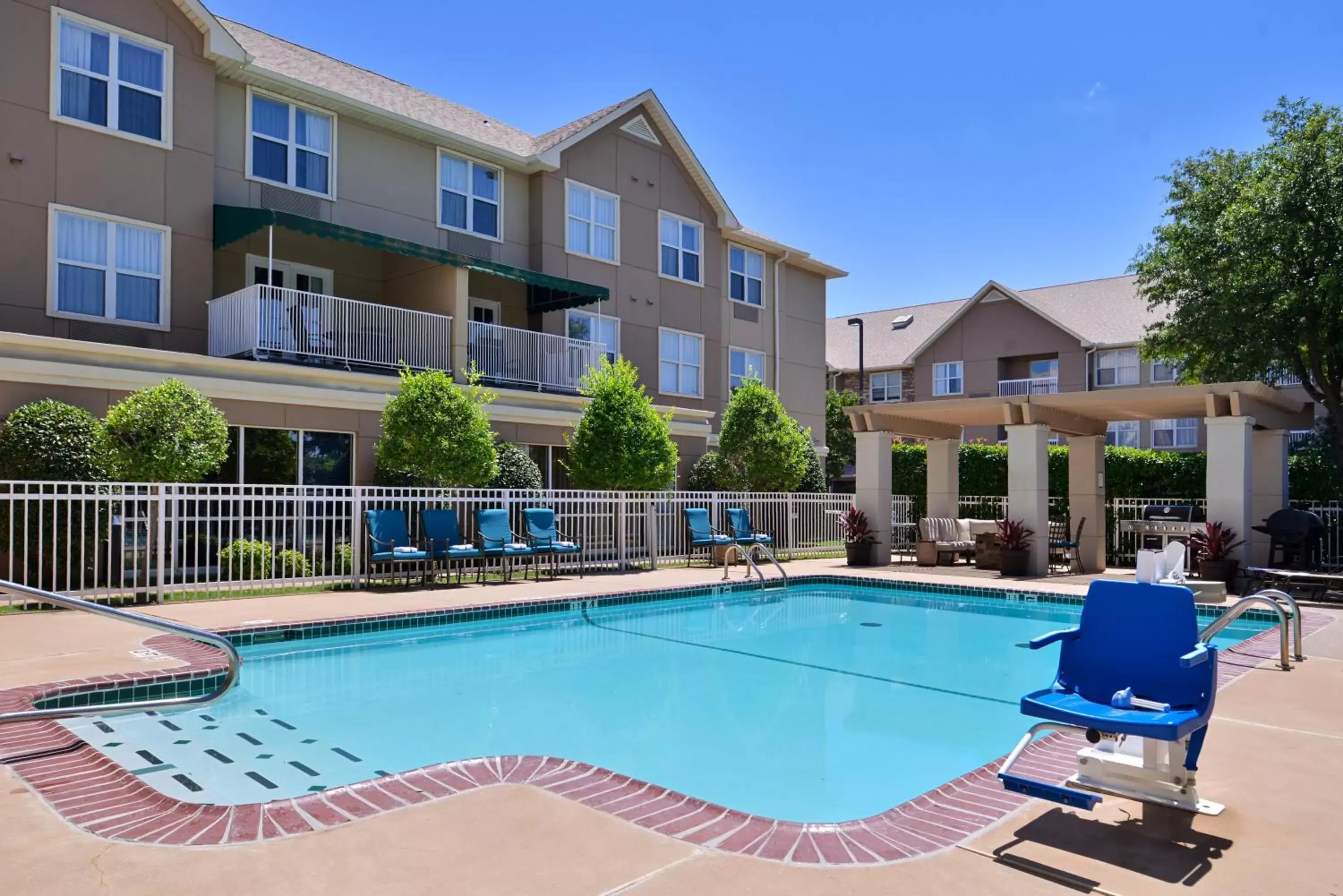 Swimming pool, Property Building in Staybridge Suites Wichita Falls, an IHG Hotel