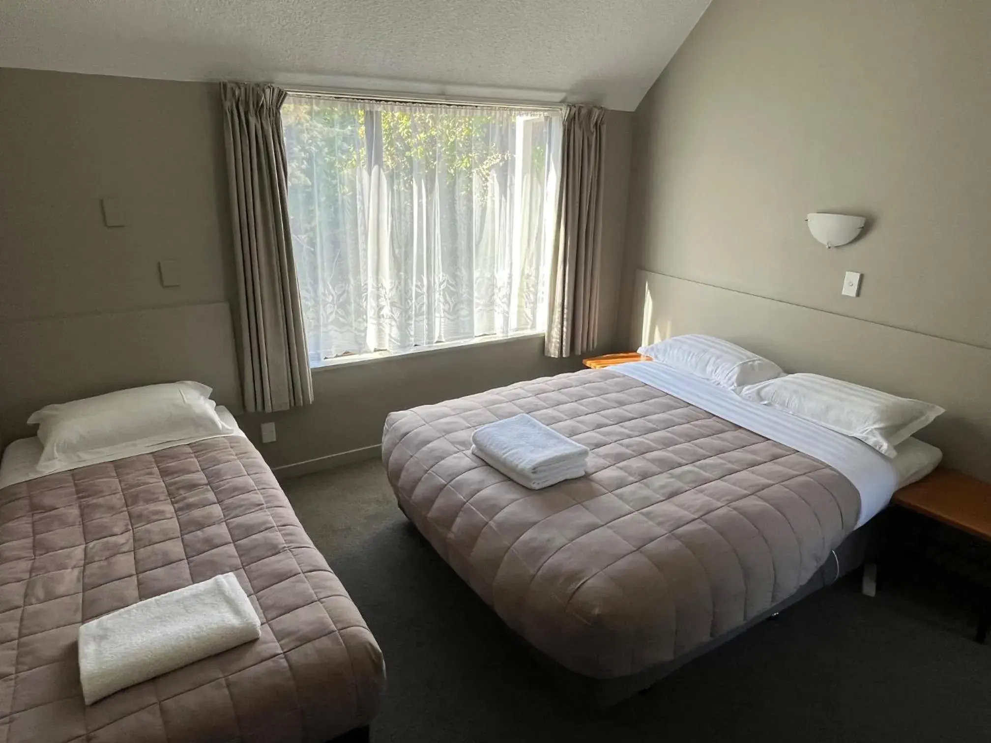 Bed in Manuka Crescent Motel