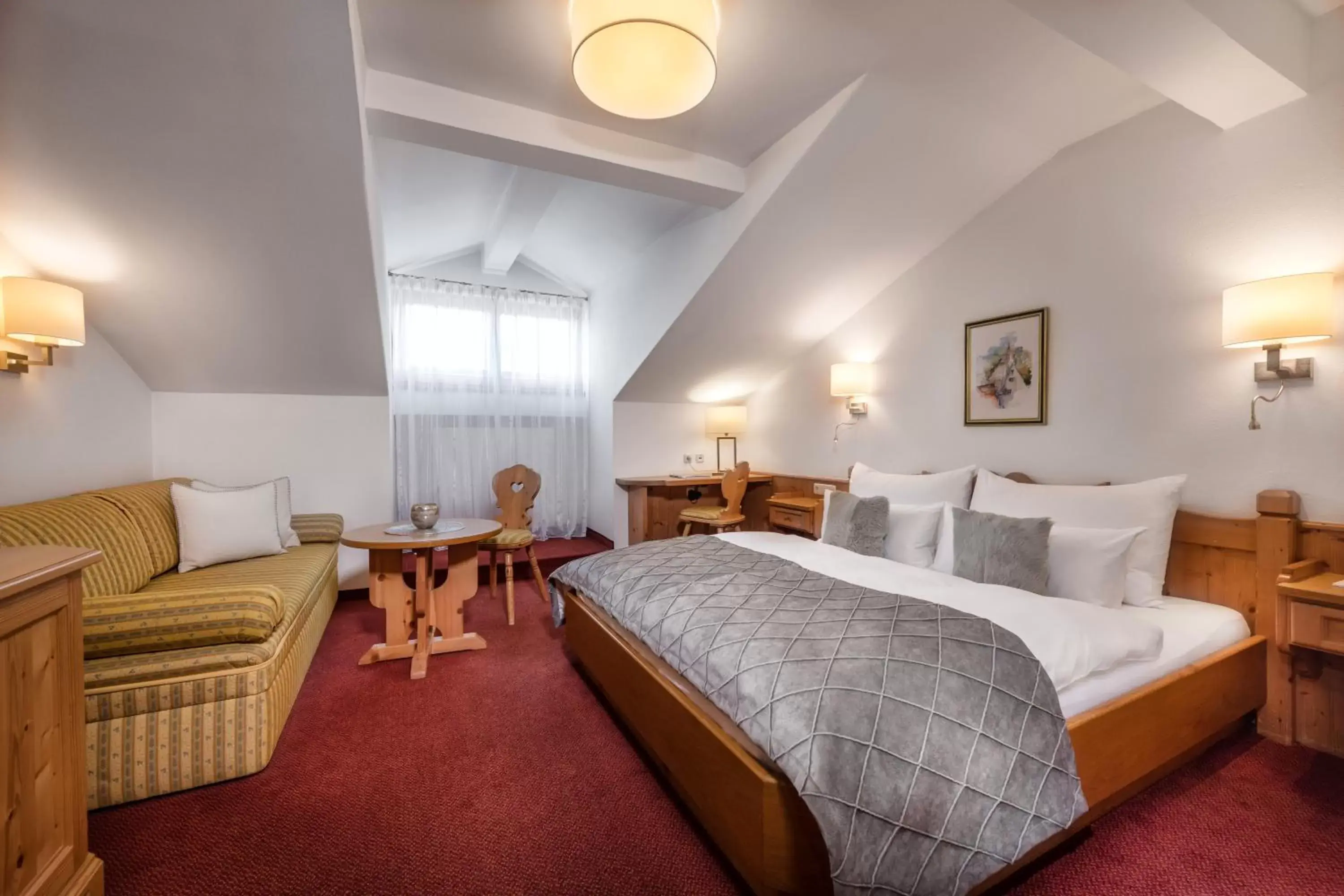 Photo of the whole room, Bed in Alpines Lifestyle Hotel Tannenhof